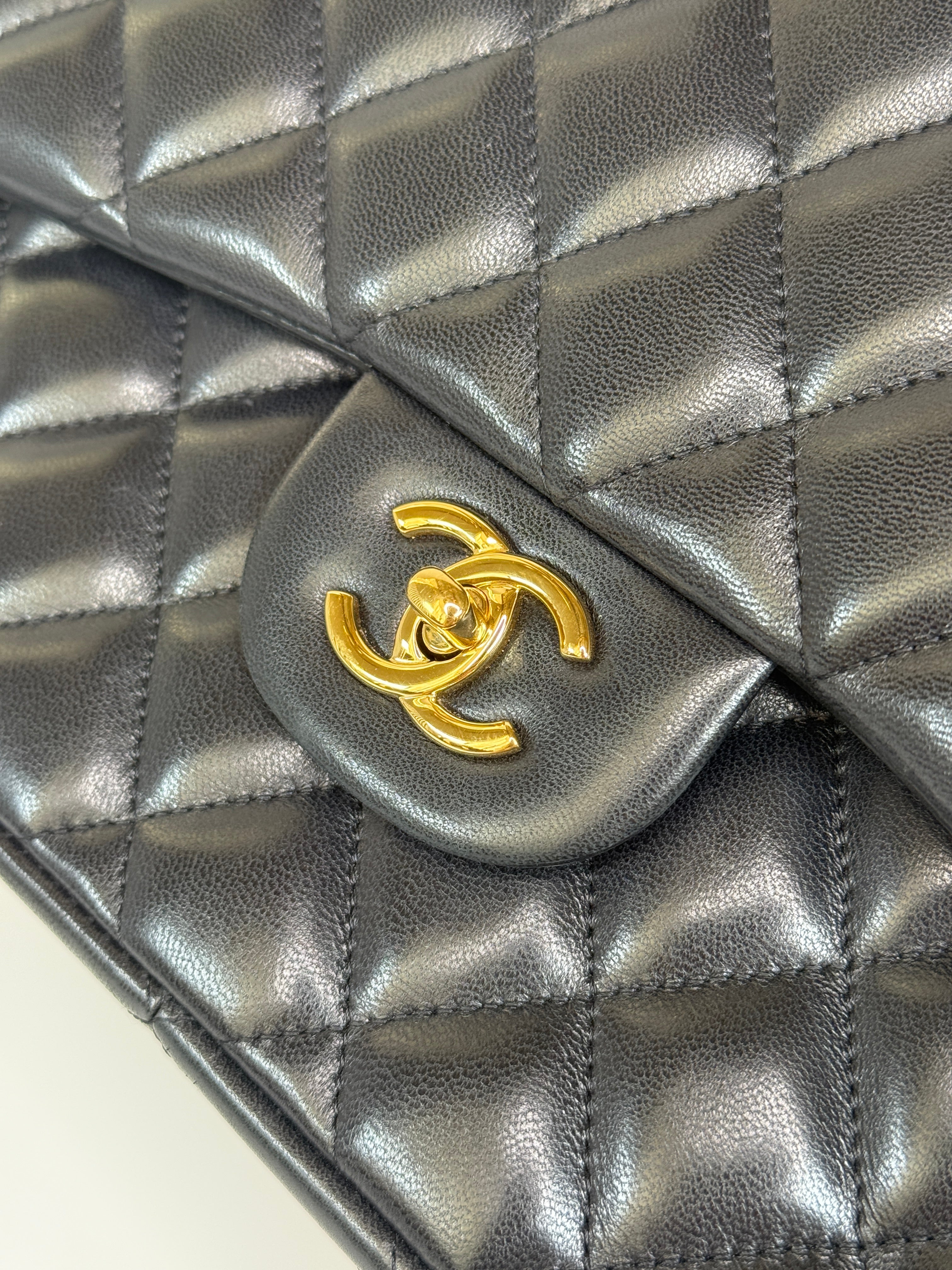 Authentic and preloved Chanel Jumbo Classic Flap Bag In Black Lambskin Leather With GOLD Hardware. Excellent condition. 100% Authenticity Guarantee