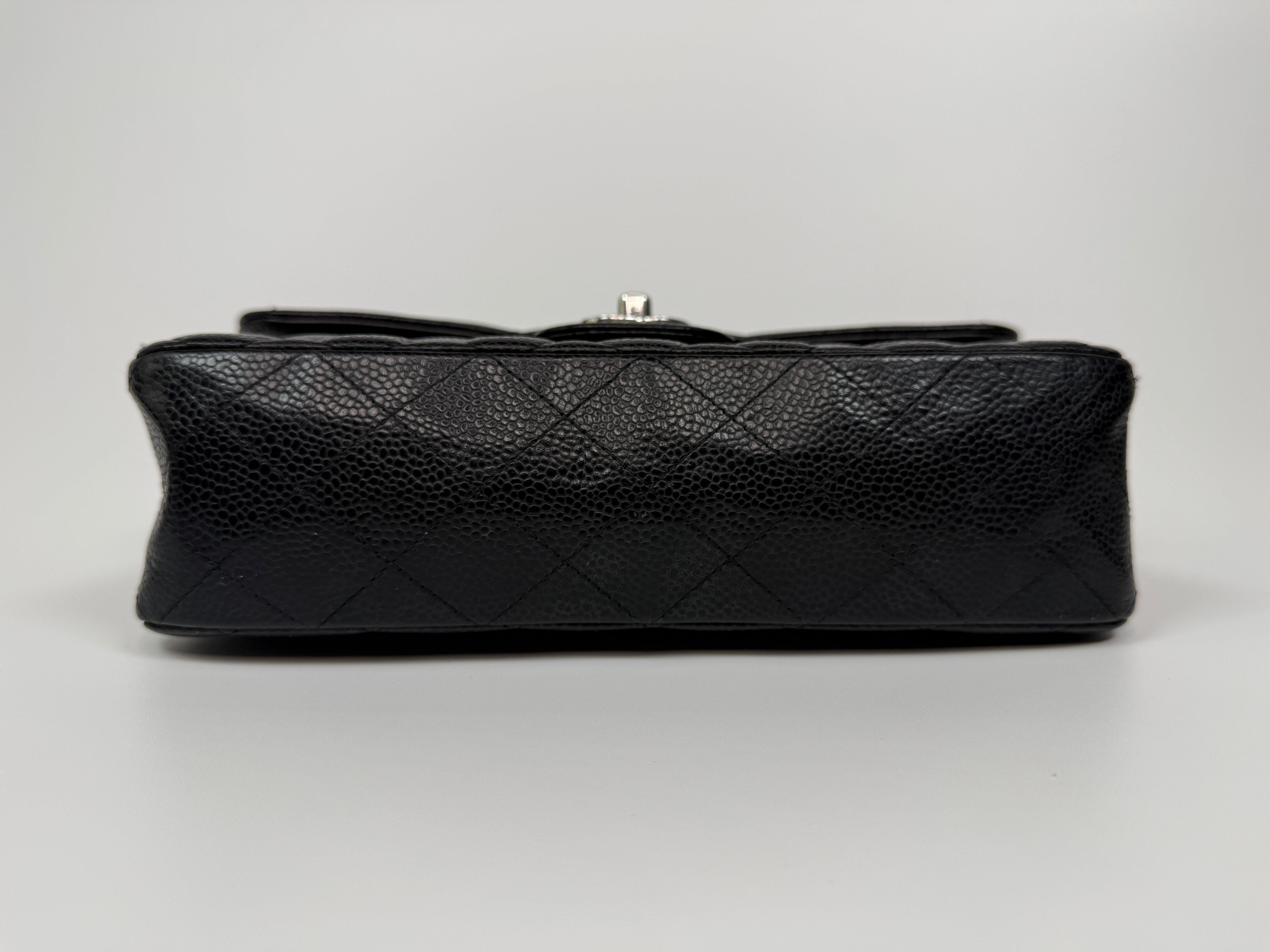 Chanel Small Classic Double Flap In Black Caviar Leather With Silver Hardware. Authentic and preloved in very good condition. 100% Authenticity guarantee