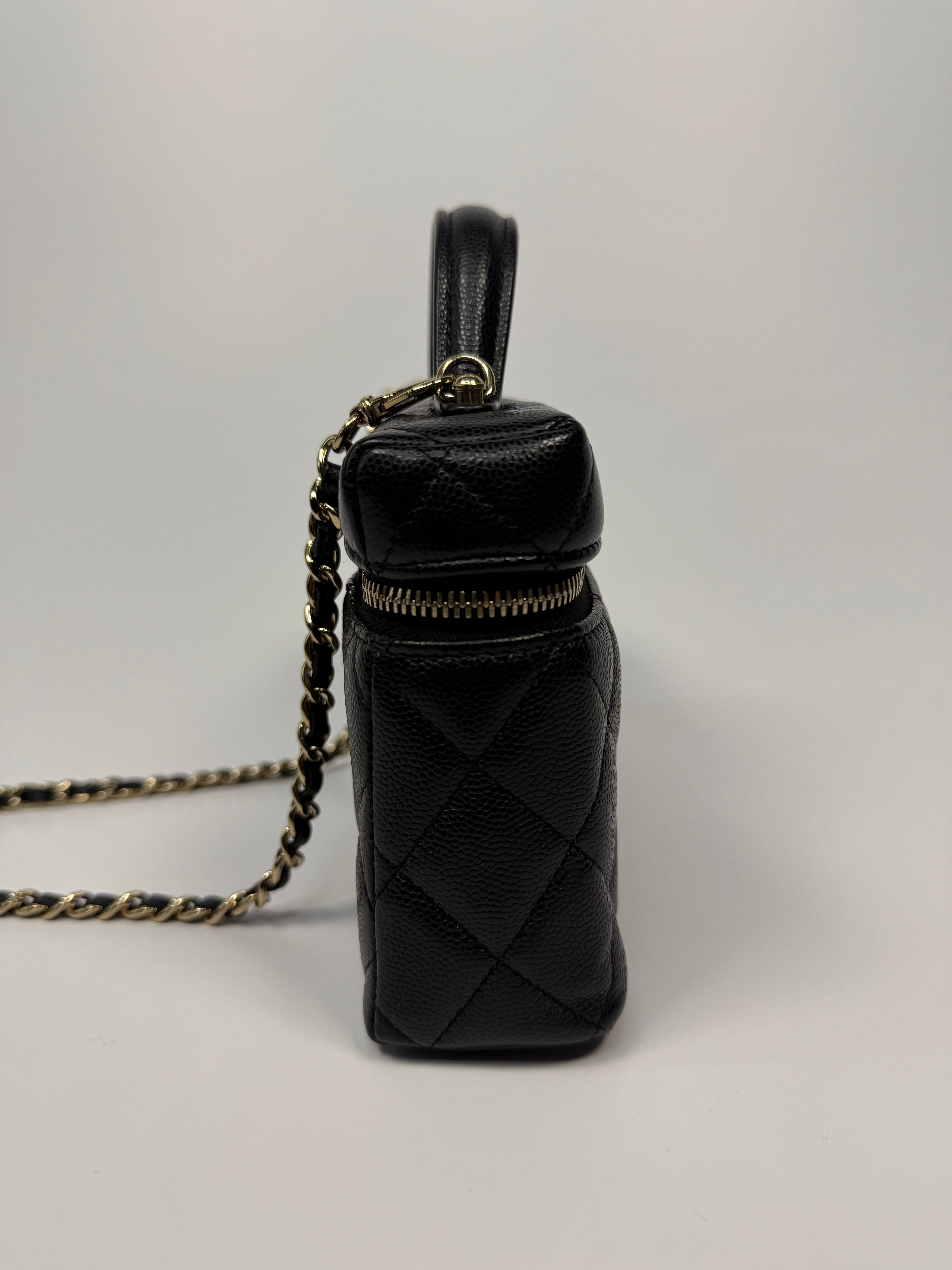 Chanel Flat Vanity In Black Caviar Leather With Gold Hardware Authentic and preloved in excellent condition.