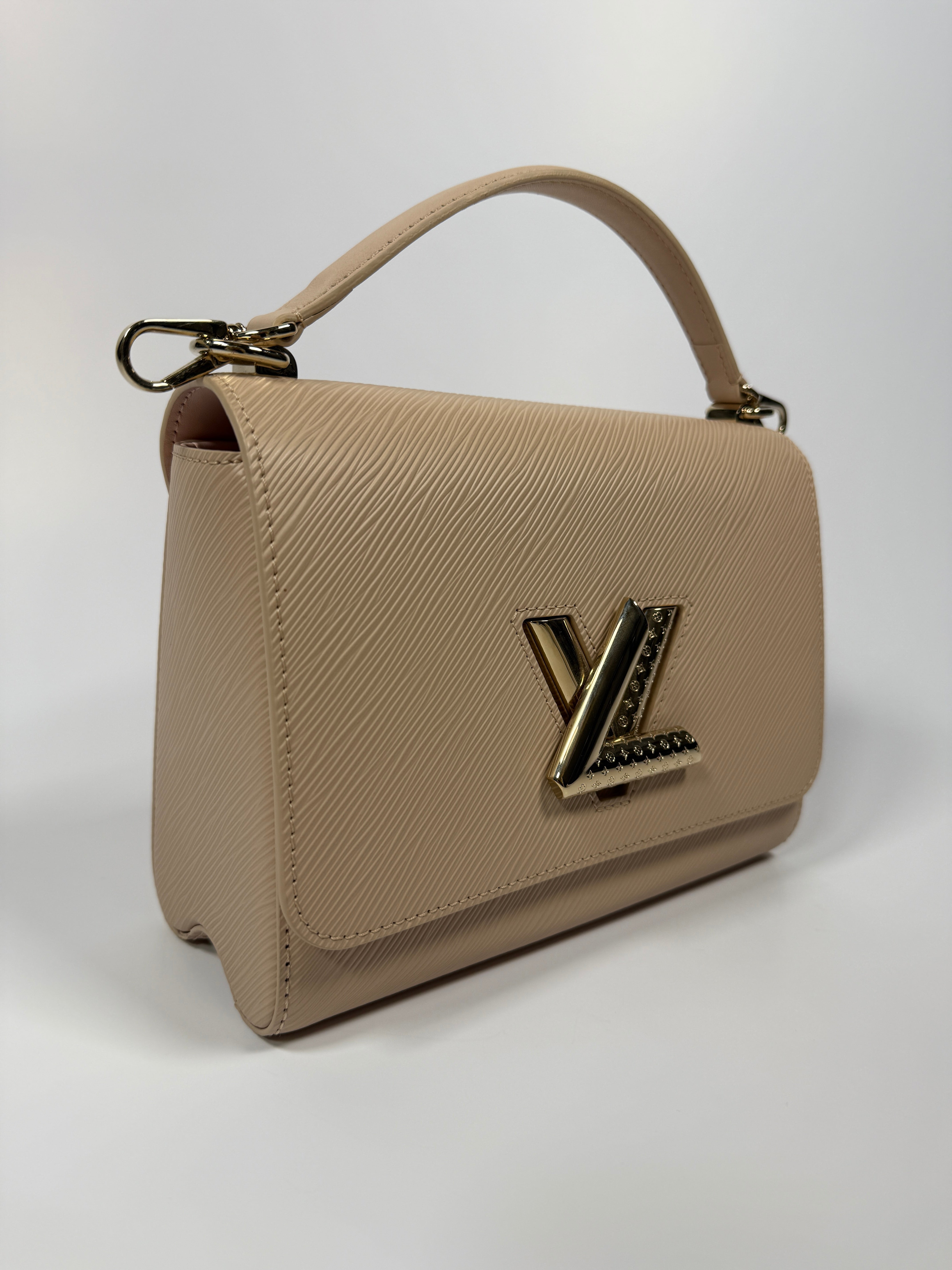 Louis Vuitton Twist MM Bag In Blush Pink Epi Leather