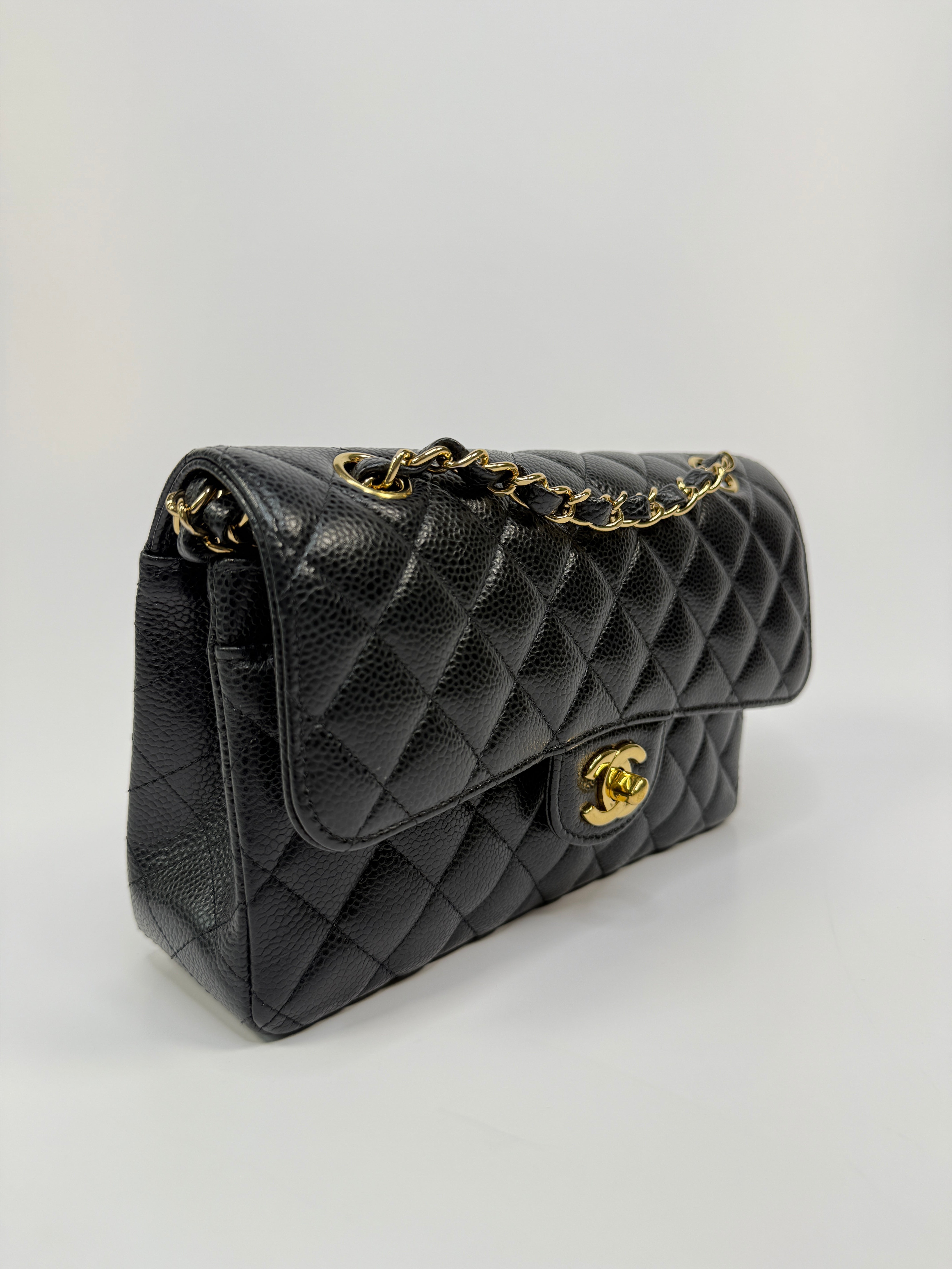 Chanel Small Classic Double Flap In Black Caviar Leather With Gold Hardware
Pre Loved & Authentic