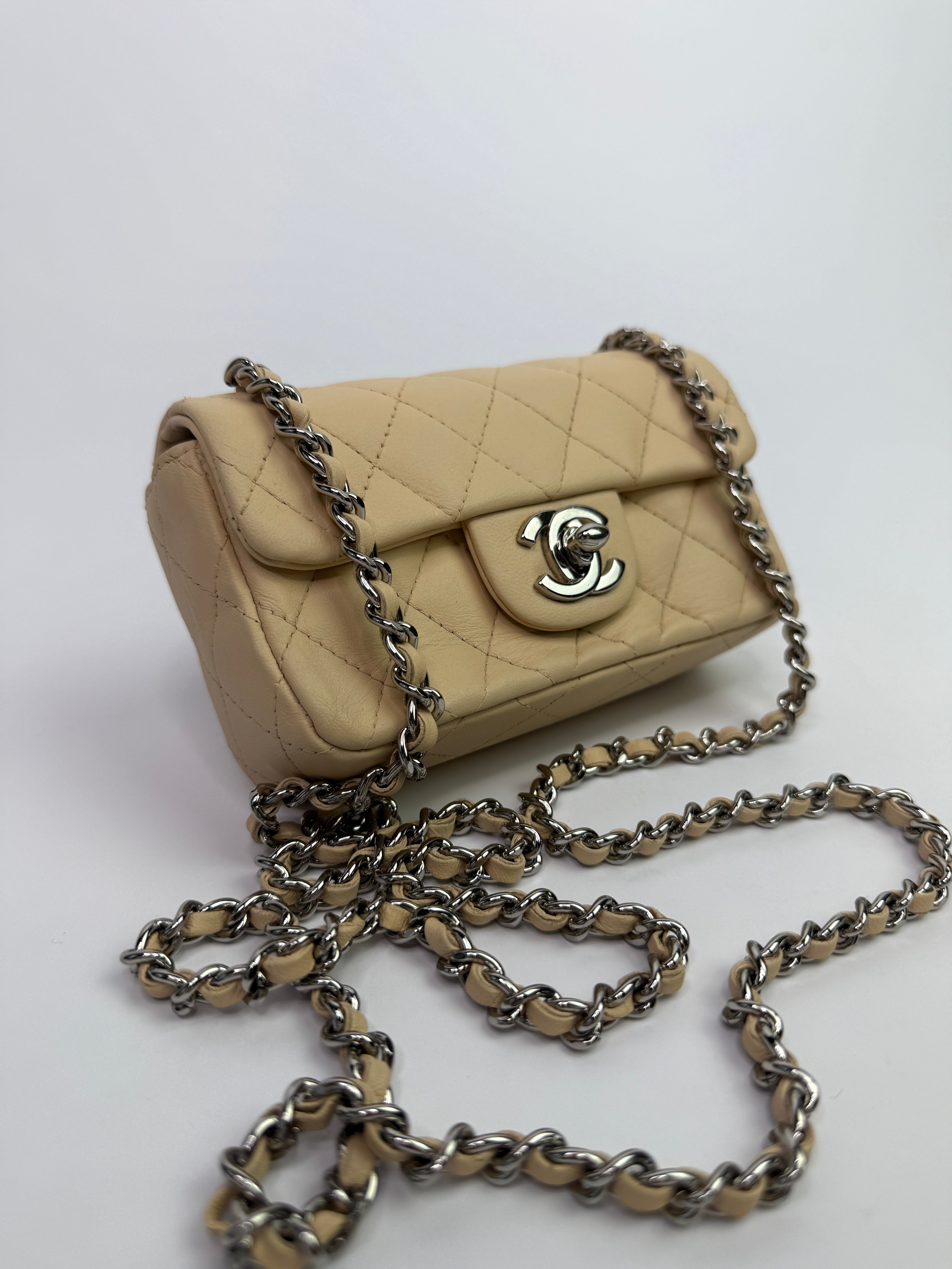 Chanel Super Mini Classic Flap Bag In Beige Lambskin With SHW