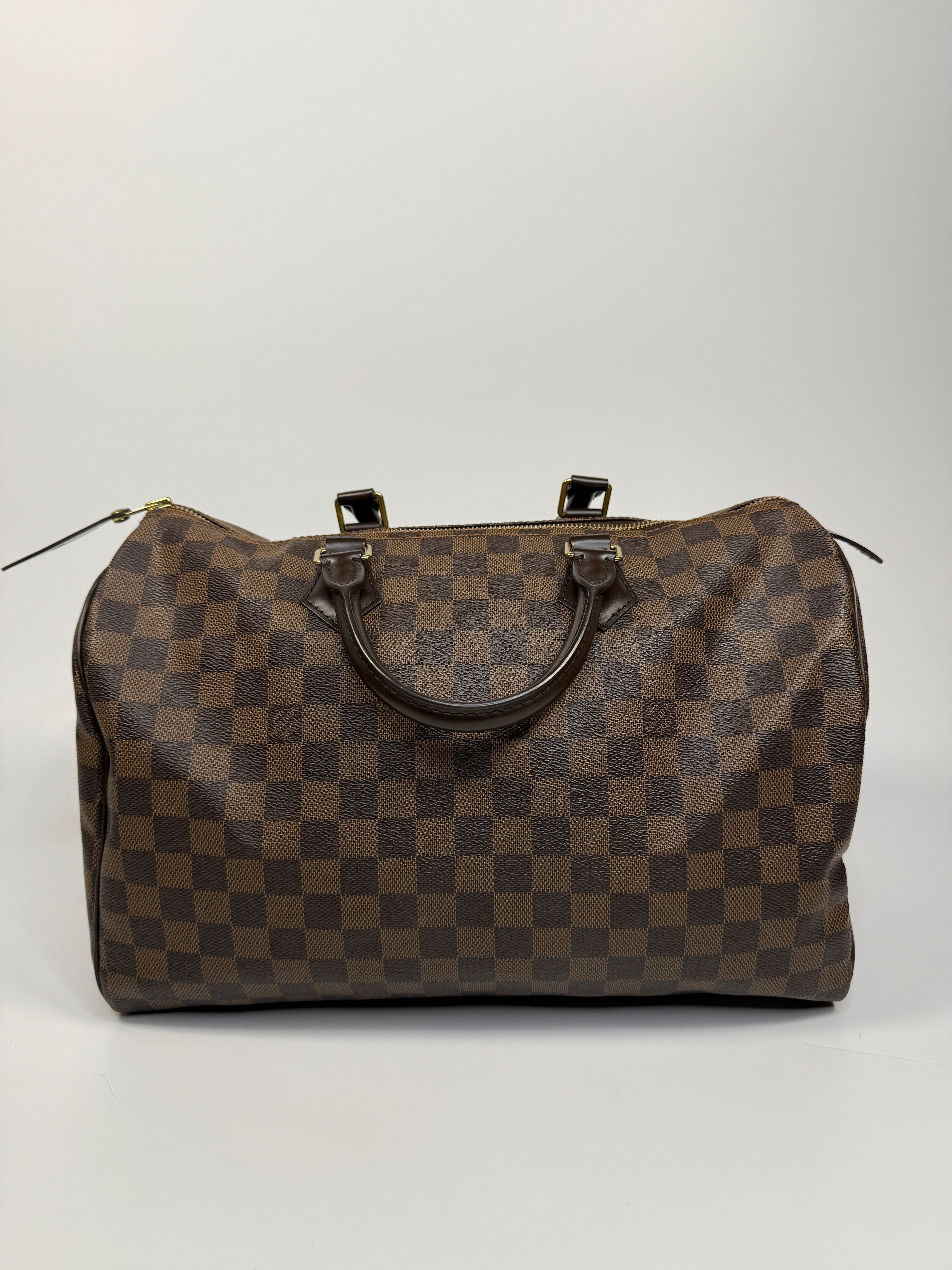 Authentic and pre loved Louis Vuitton Damier Ebene Speedy 35 In Damier Ebene With Gold Hardware In Excellent Condition