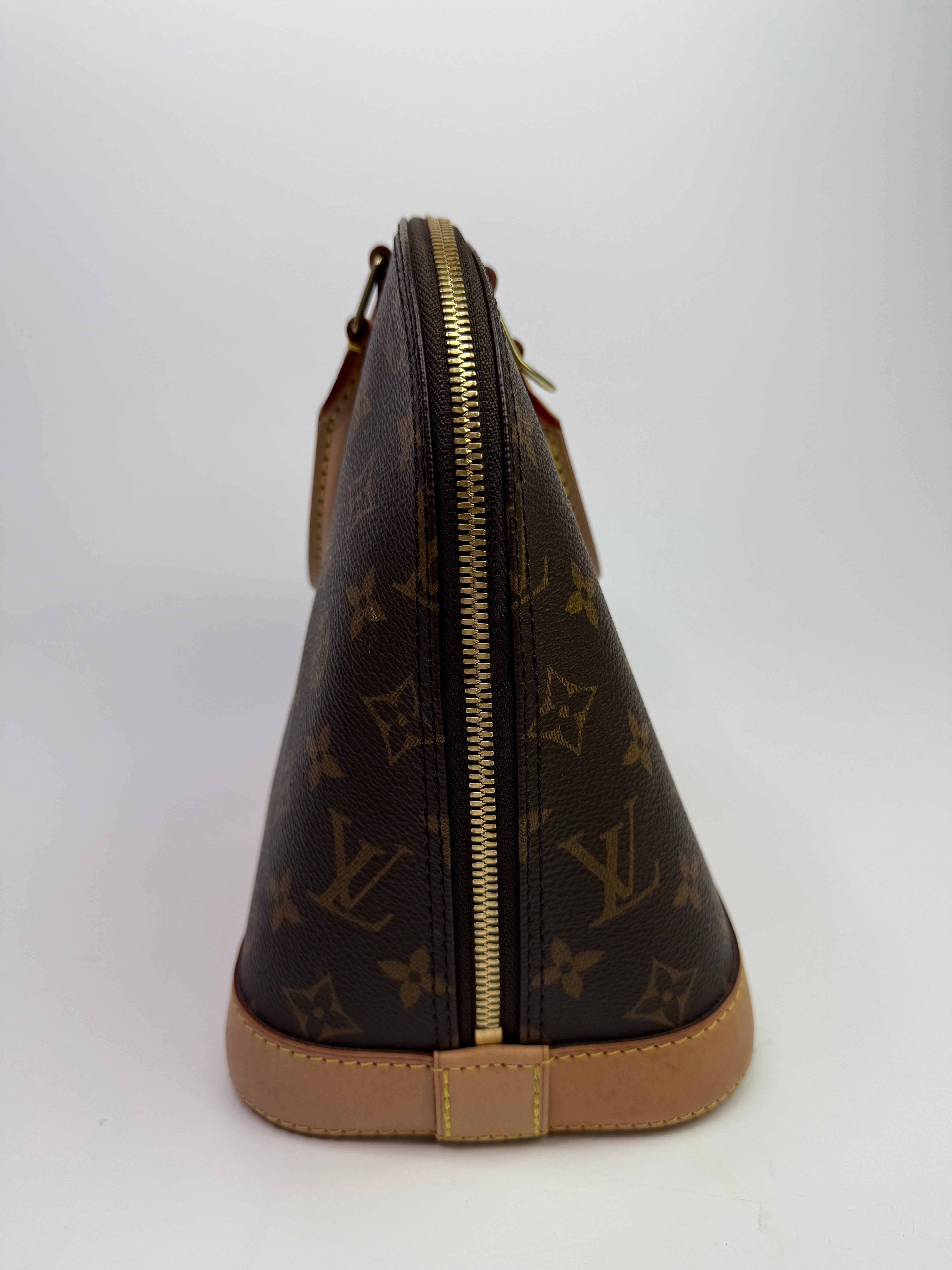 Louis Vuitton Monogram Alma PM Handbag