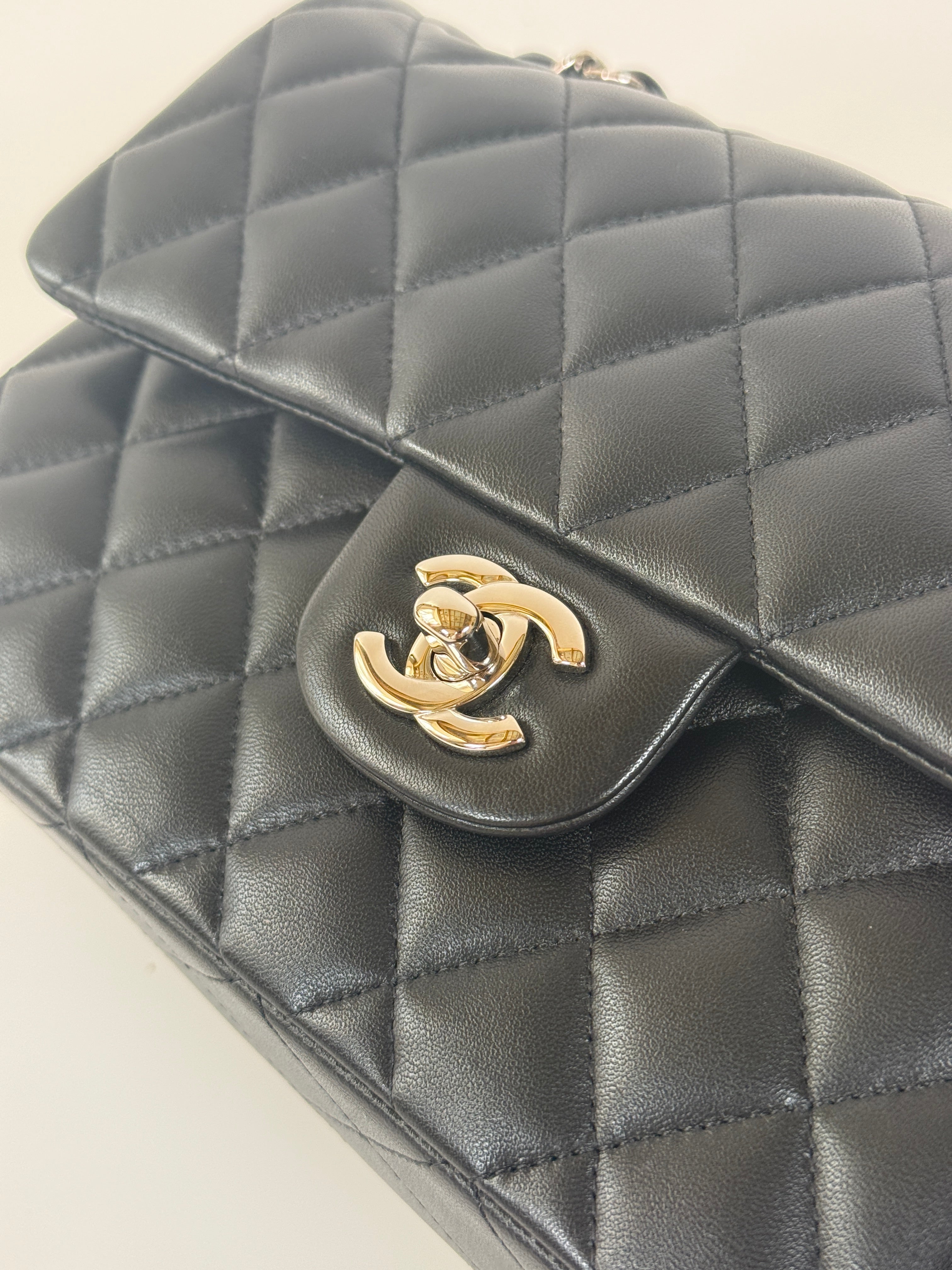 Chanel Small Classic Double Flap In Black Lambskin Leather With Silver Hardware Authentic and preloved in excellent condition. 100% Authenticity guarantee