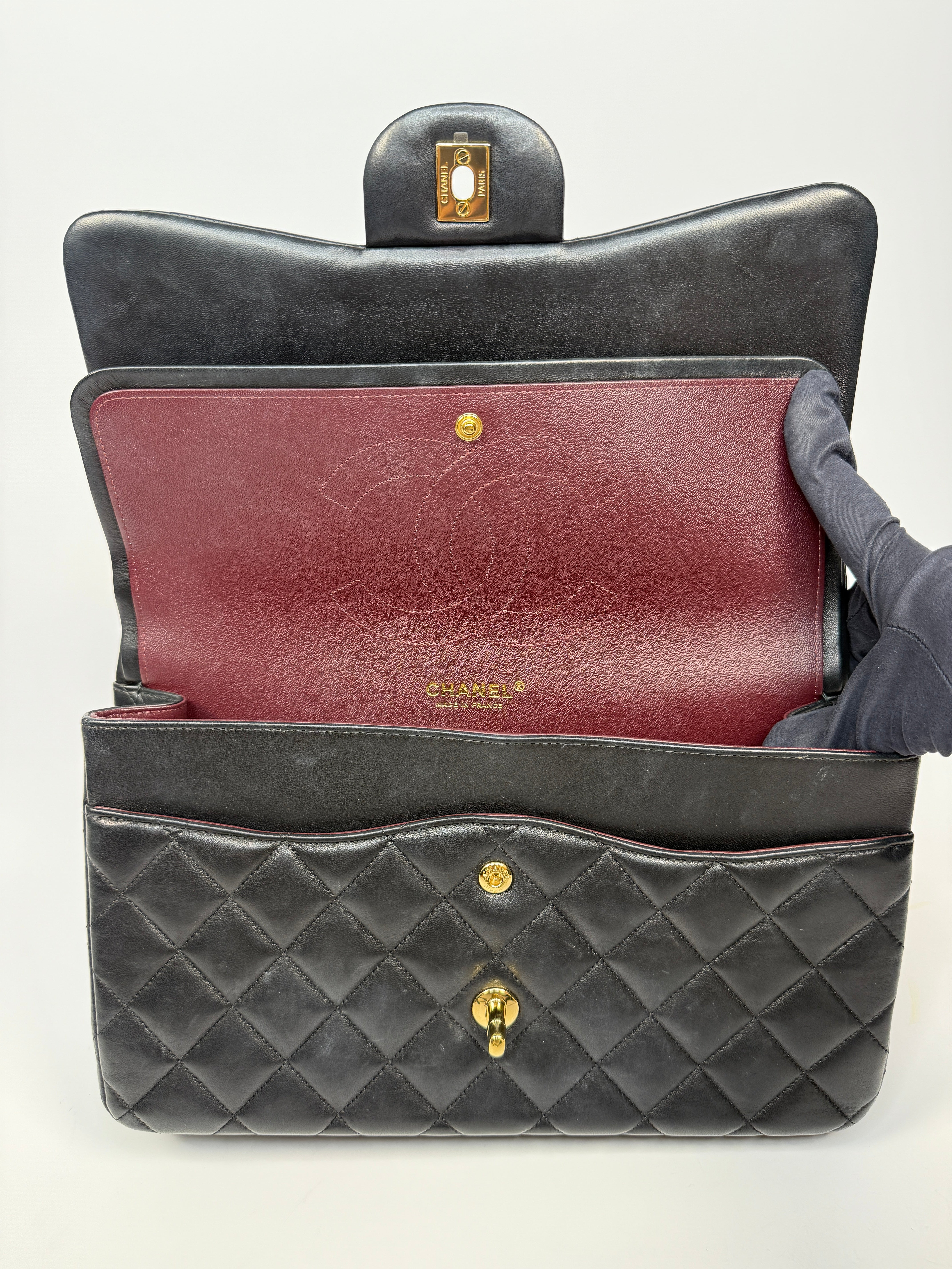 Chanel Jumbo Classic Flap Bag In Black Lambskin Leather With Gold Hardware
Pre Loved & Authentic