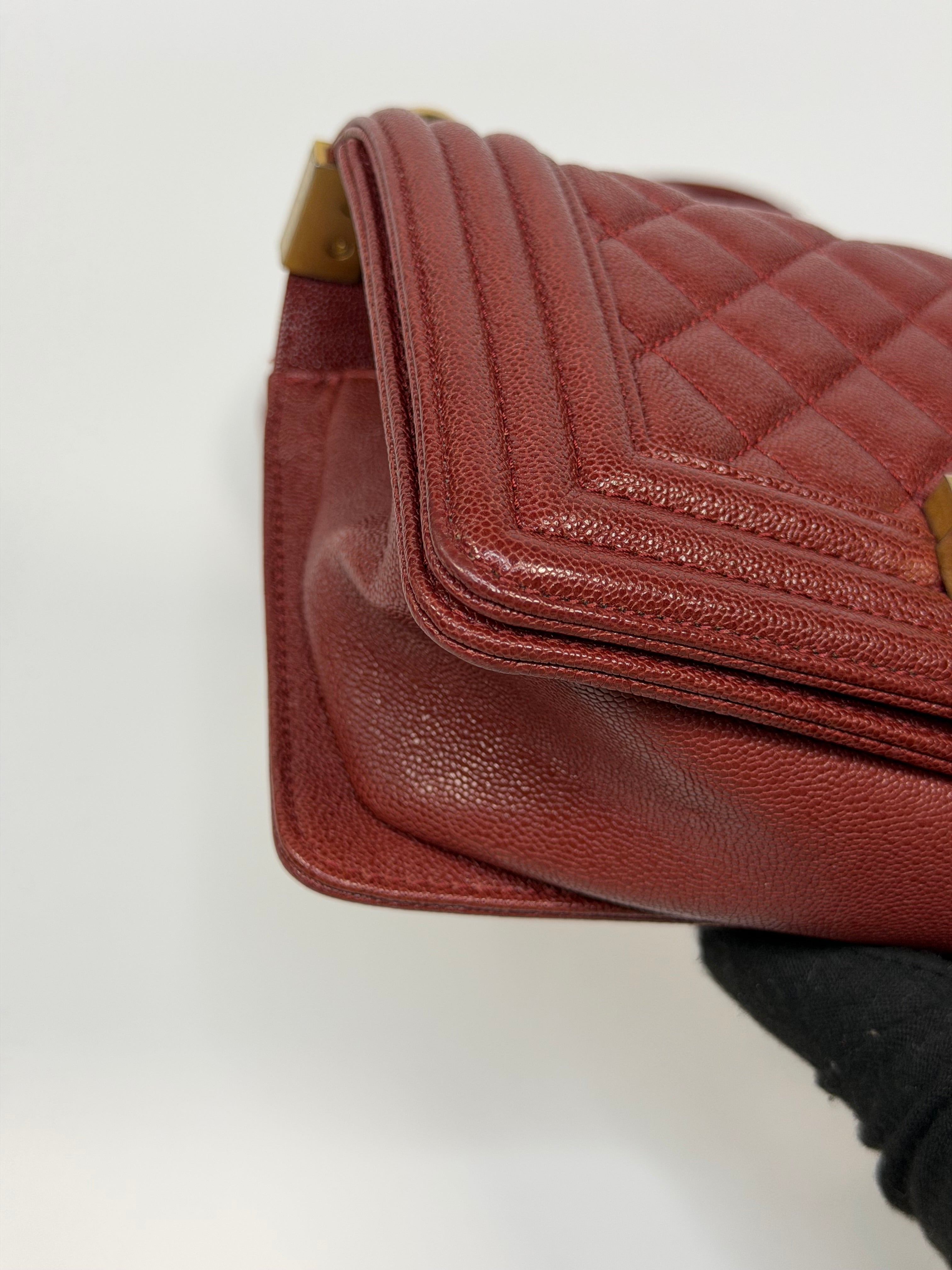 Chanel Le Boy Bag In Burgundy Caviar Leather Gold Hardware. Authentic and preloved in excellent condition.
