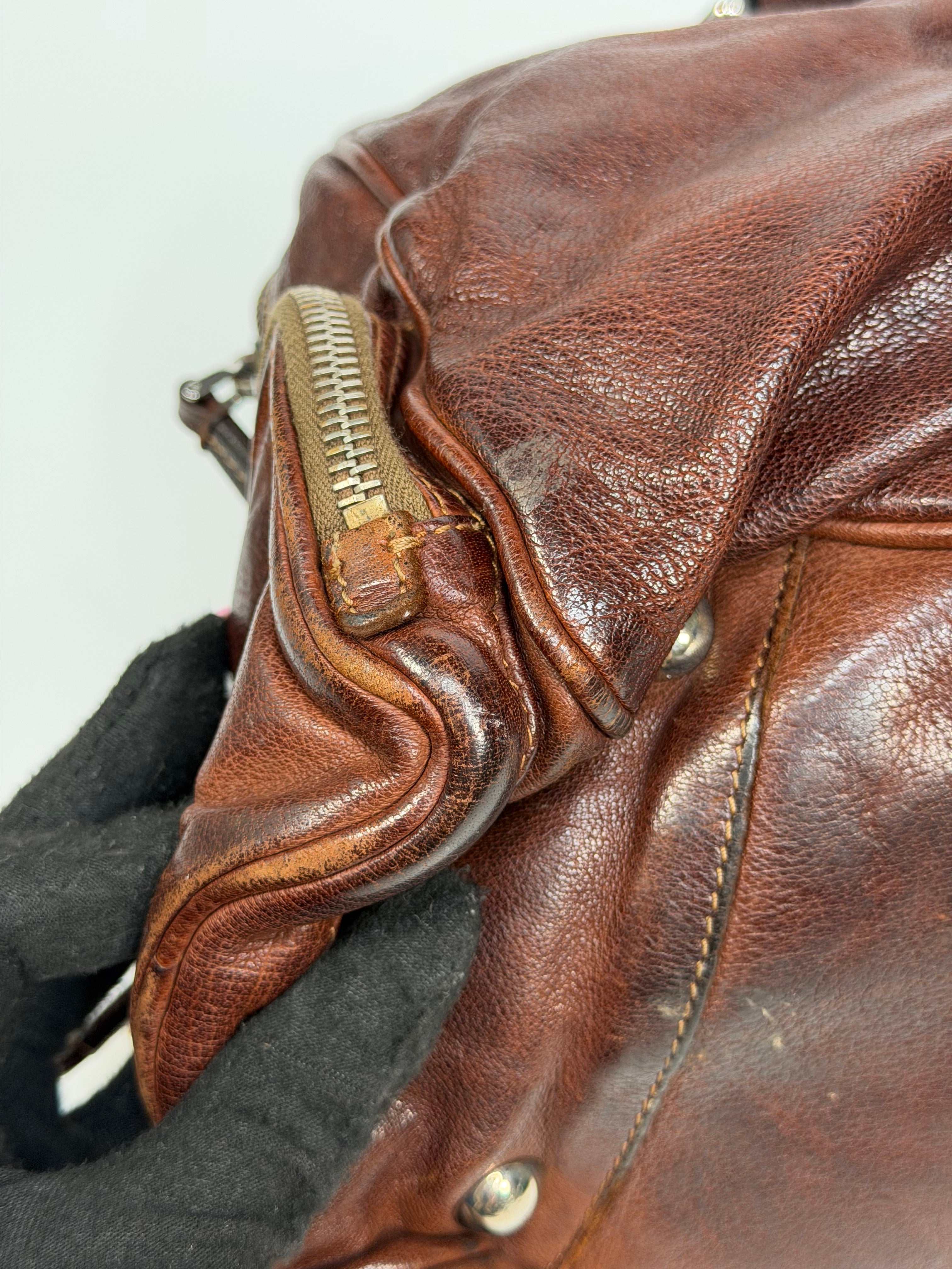 Prada Washed Bauletto Shoulder Bag In Brown Leather With Gold Hardware. Authentic and preloved in very good condition