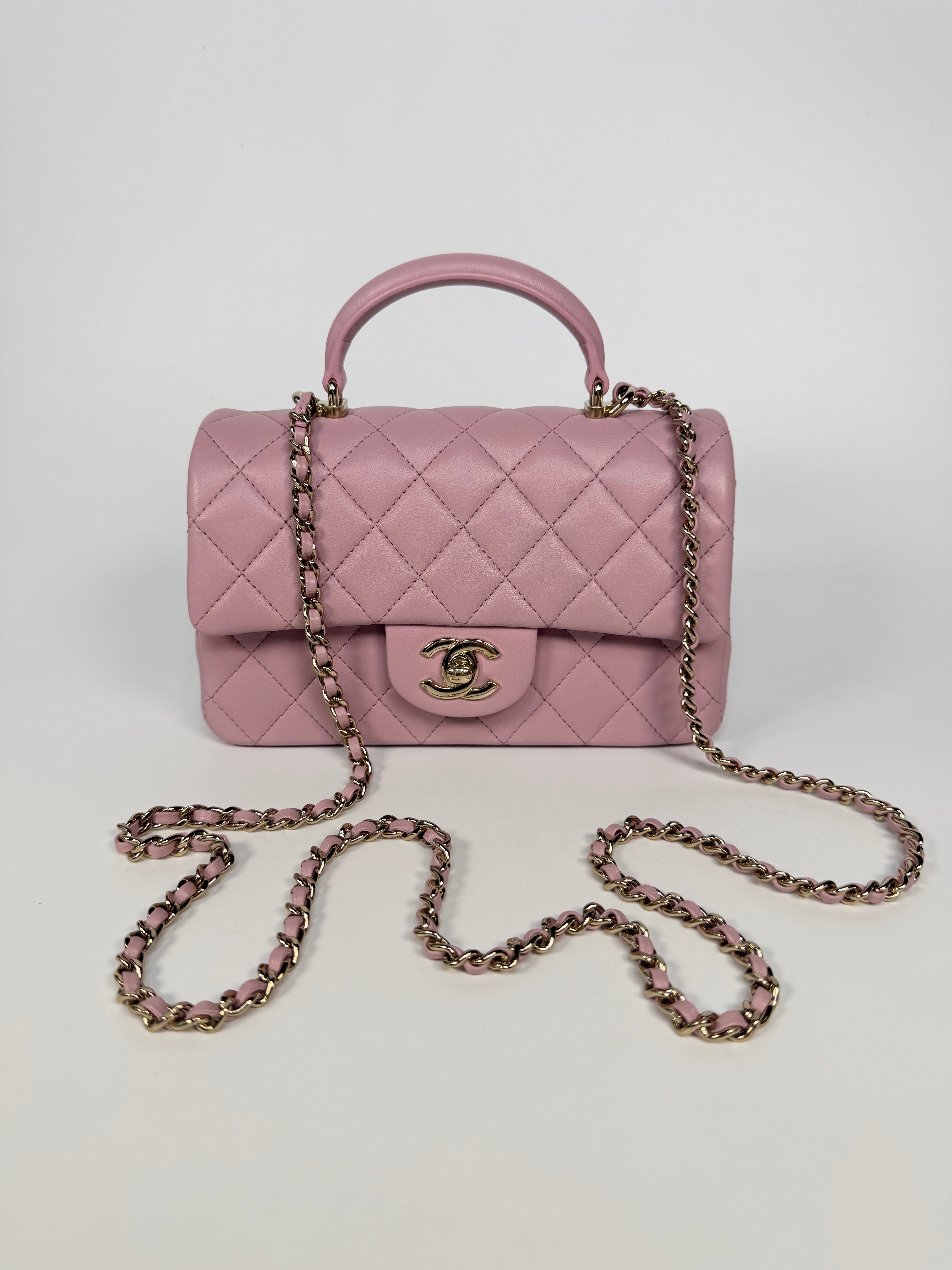 Chanel Mini Rectangle Top Handle In Pink Lambskin Leather With Pale Gold Hardware. 100% authentic and preloved in excellent condition