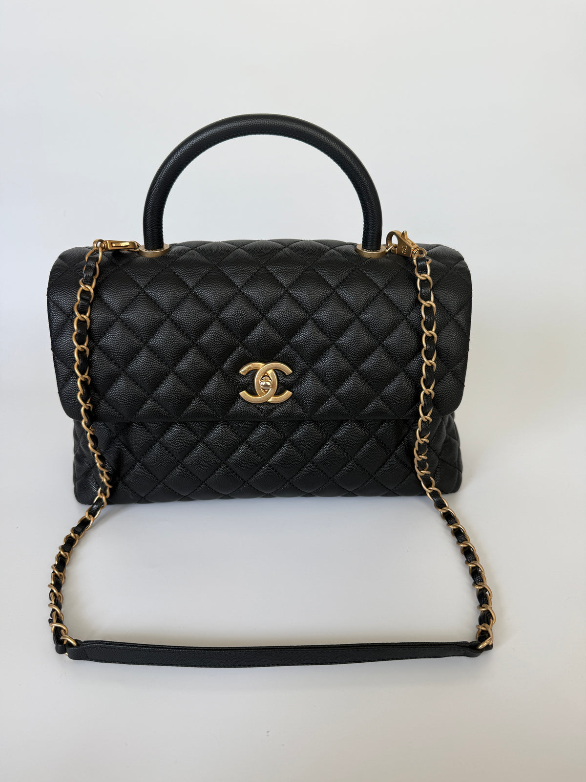 Chanel Coco Large Top Handle In Caviar Leather With Gold Hardware. Verified by Luxe Cheshire. Trusted designer resale.