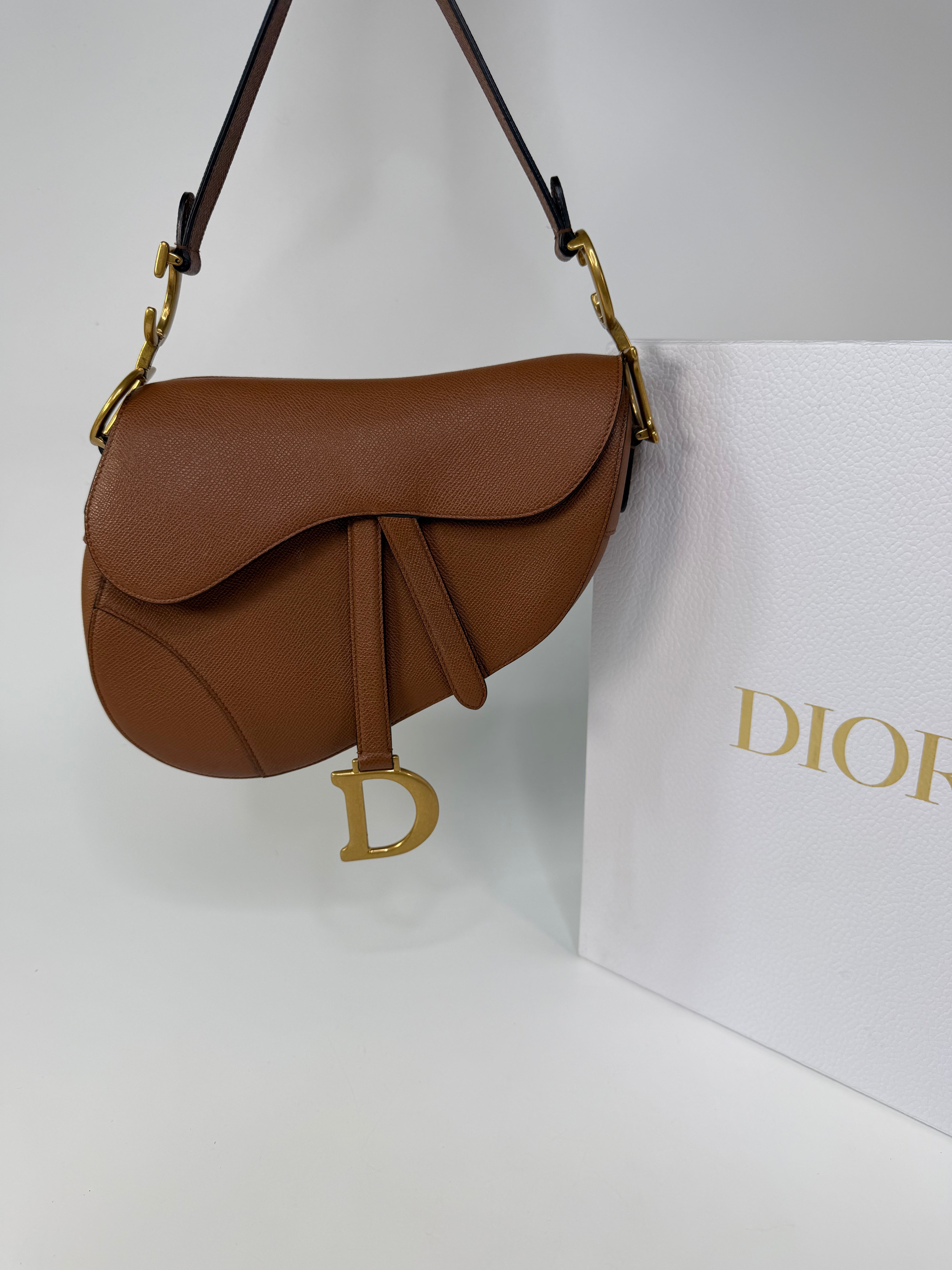 Christian Dior Saddle Bag In Golden Calfskin Gold Hardware. 100% authentic and preloved in excellent condition.