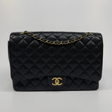 Chanel Maxi Classic Double Flap In Black Caviar Leather With GHW