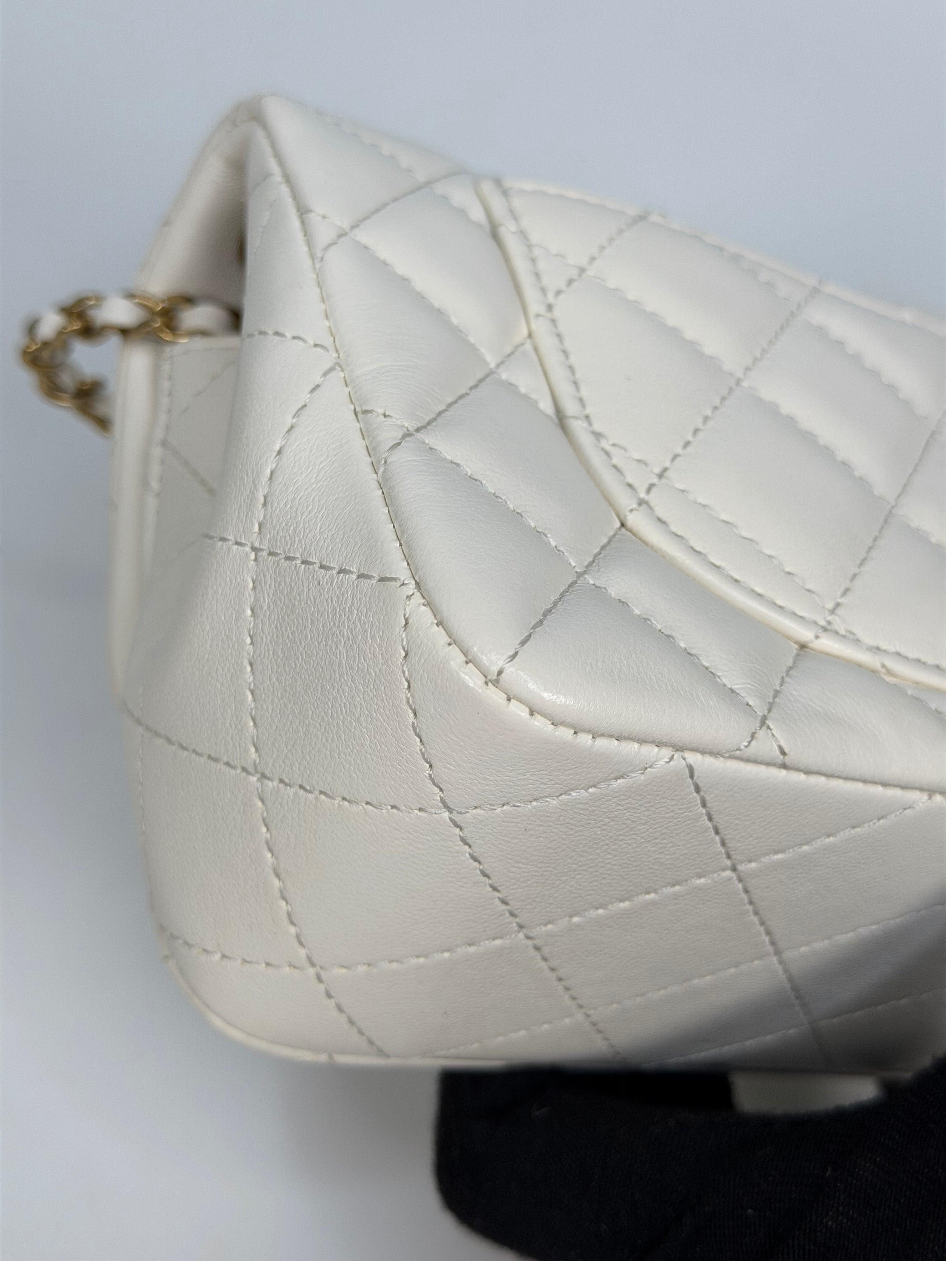Chanel Pearl Crush Mini Rectangle In White Lambskin Leather Gold Hardware. Authentic and preloved in excellent condition with 100% authenticity guarantee.