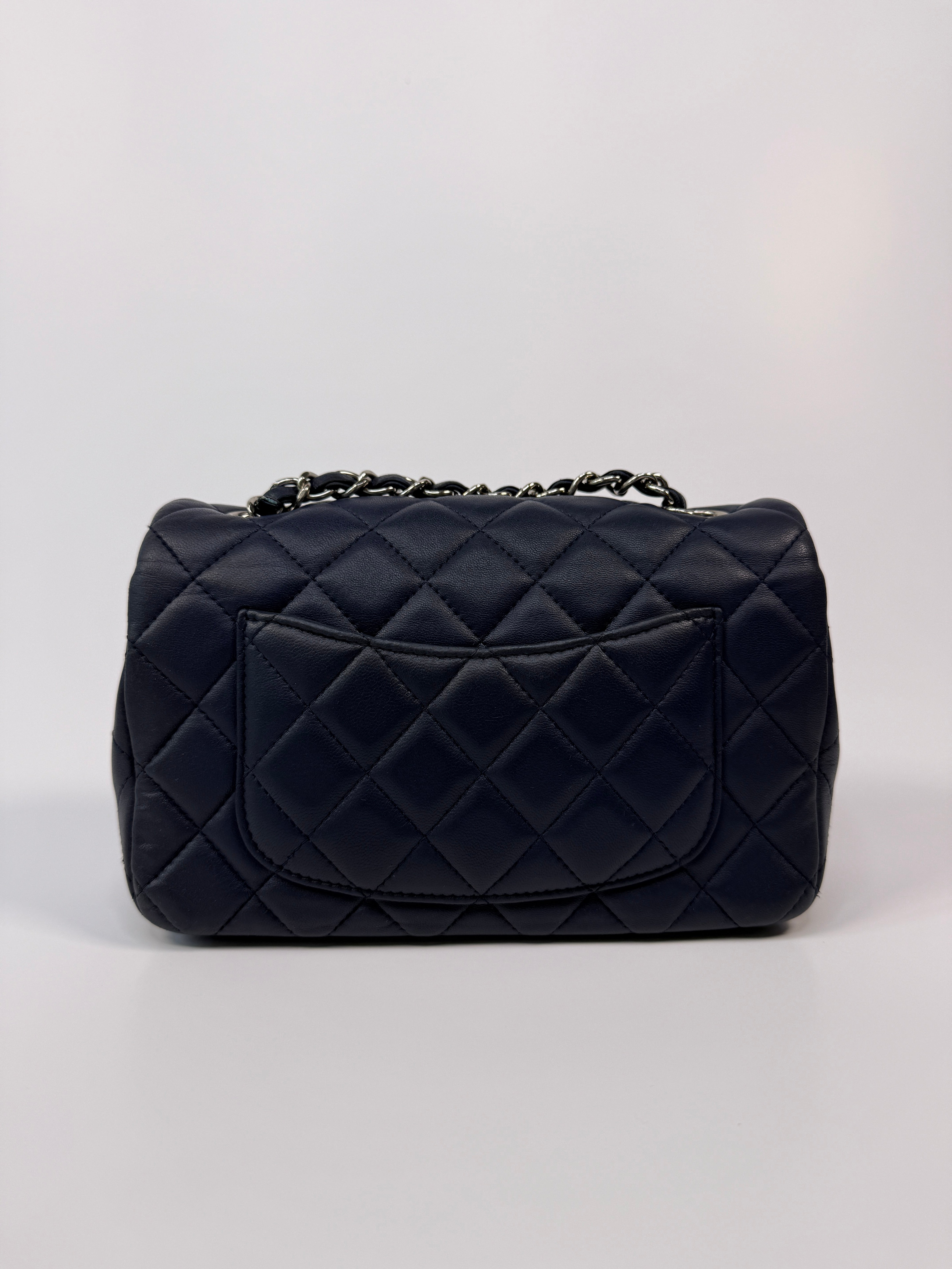 Chanel Mini Rectangle Flap Bag In Navy Lambskin With Silver Hardware
Pre Loved & Authentic