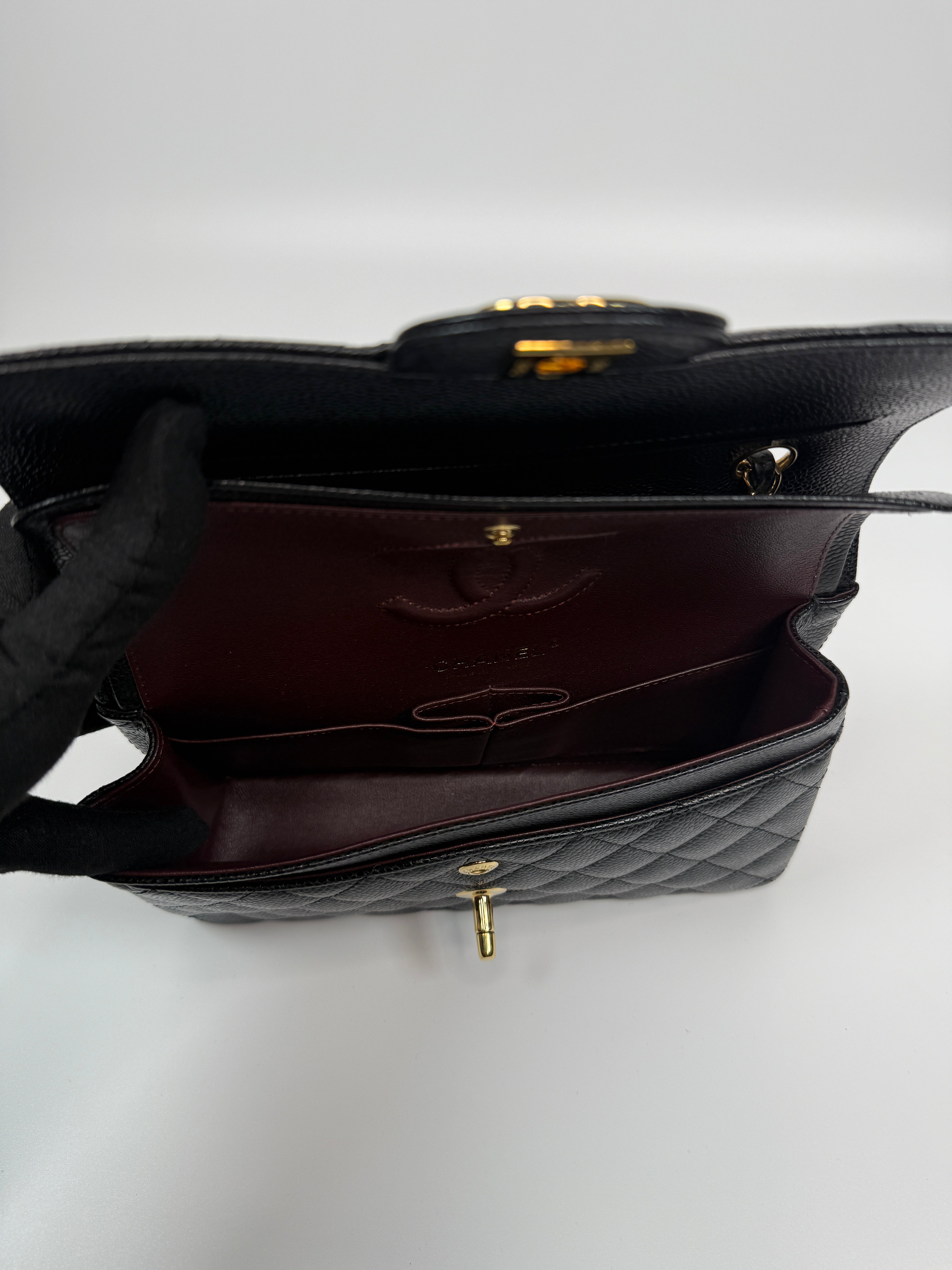 Chanel Small Classic Double Flap In Black Caviar Leather With Gold Hardware Authentic and Preloved In Excellent Condition. 100% Authenticity guarantee