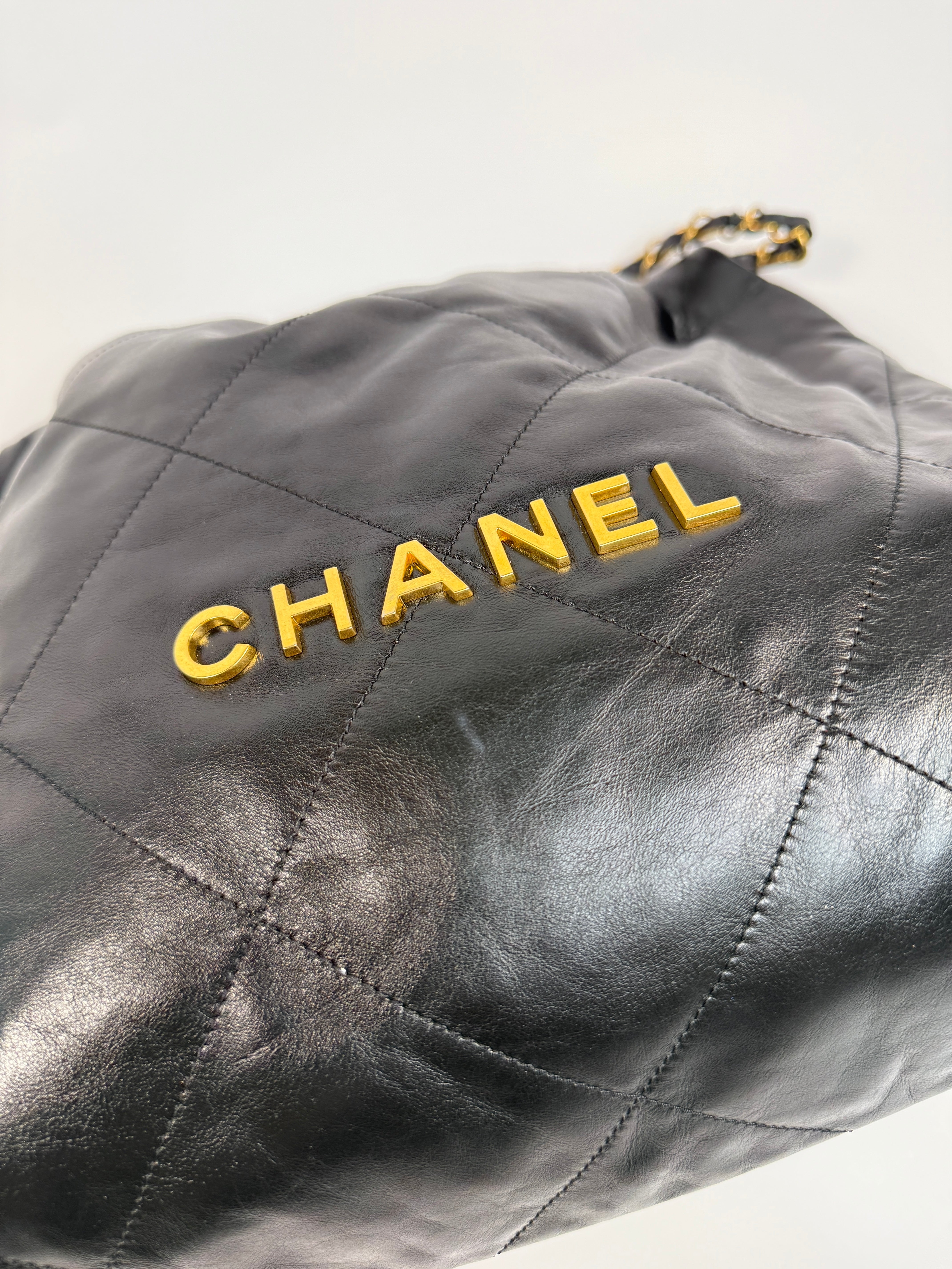 Chanel 22 Handbag In Black Calfskin Leather With Gold Hardware. Excellent Condition. Authentic and Preloved