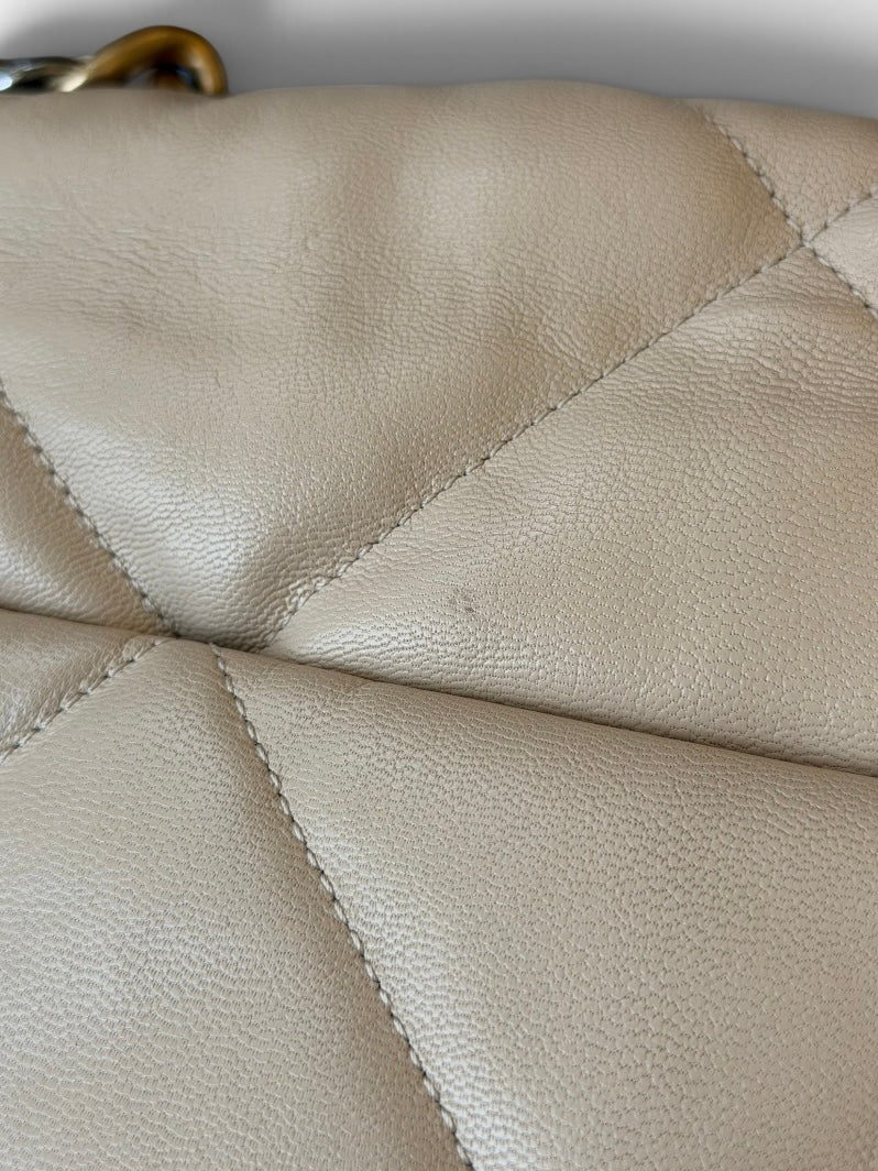 Chanel 19 Maxi In Cream Lambskin Leather With Mixed Hardware. 100% authentic and preloved in excellent condition