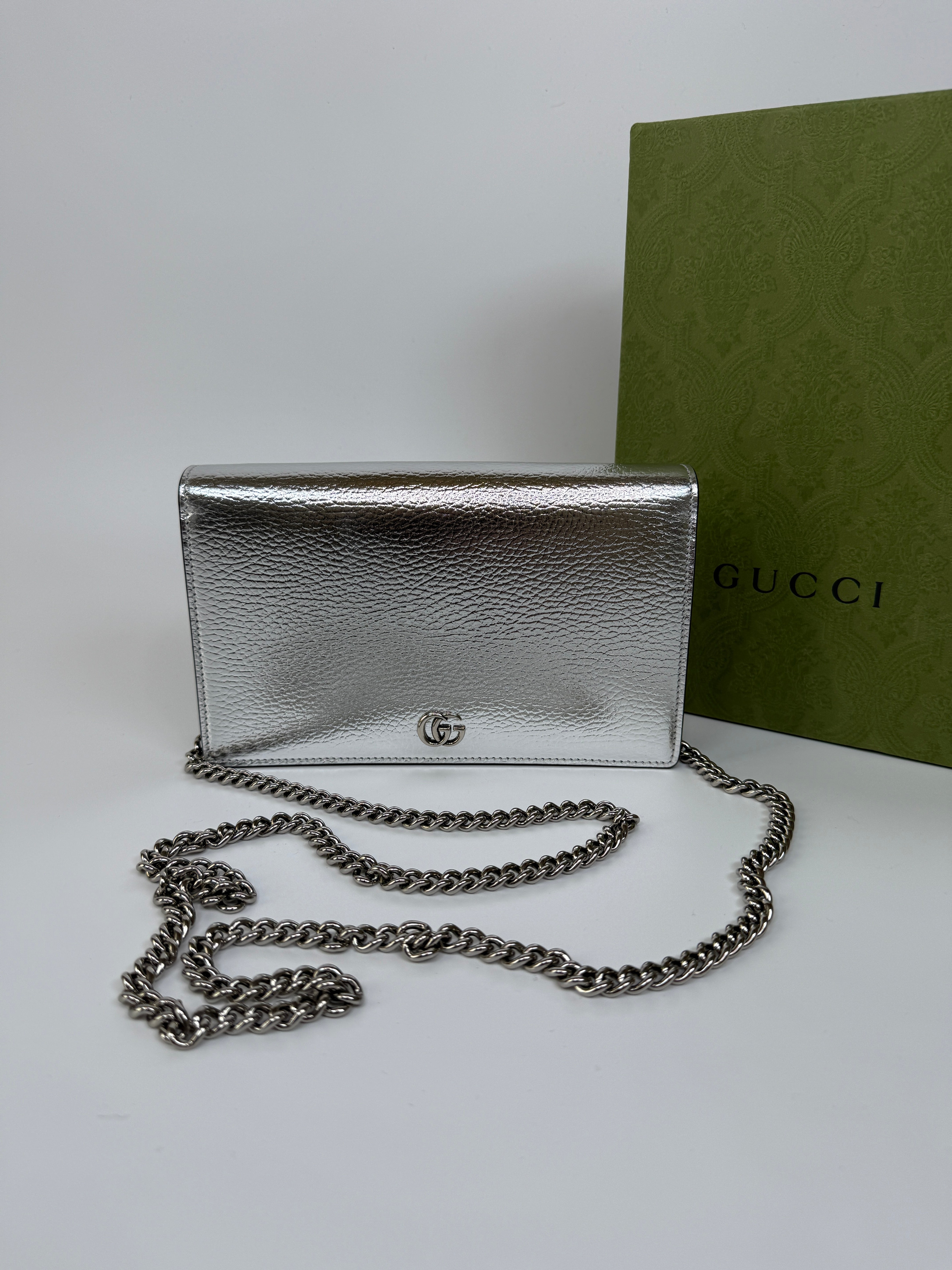 Authentic and preloved Gucci GG Marmont Leather Wallet On Chain In Metallic Silver Leather. Excellent Condition. 100% Authenticity guarantee.
