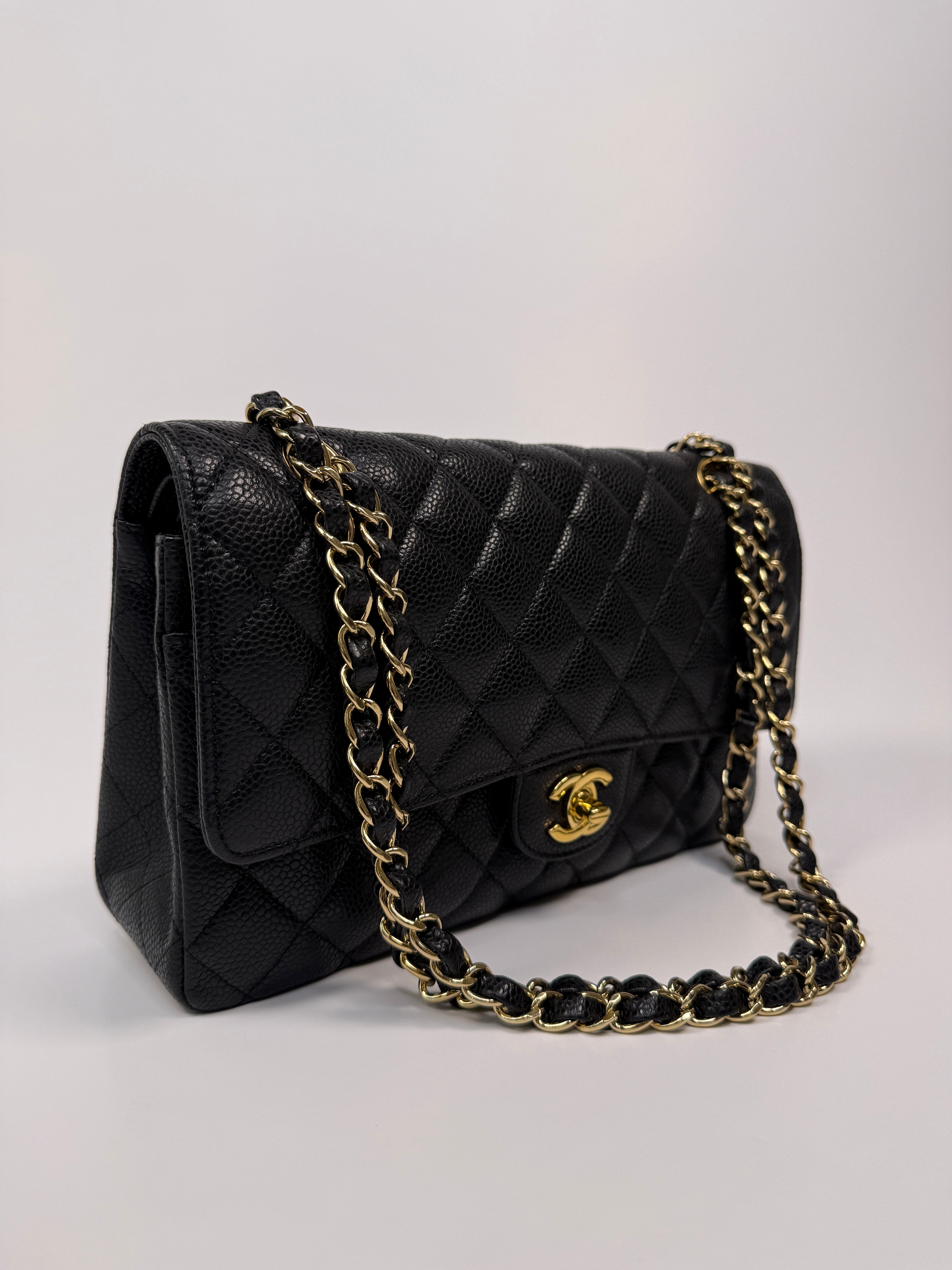 Chanel Medium Classic Double Flap Black CaviarWith Gold Hardware
Pre Loved & Authentic