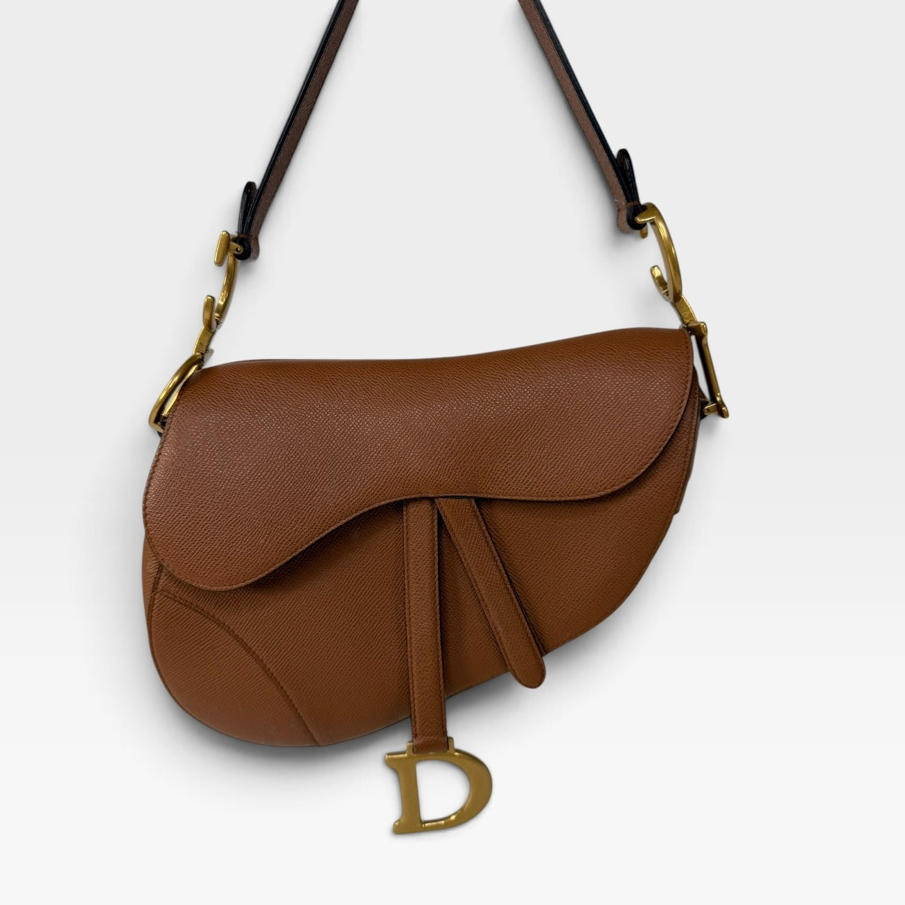 Christian Dior Saddle Bag In Golden Calfskin Gold Hardware. 100% authentic and preloved in excellent condition.