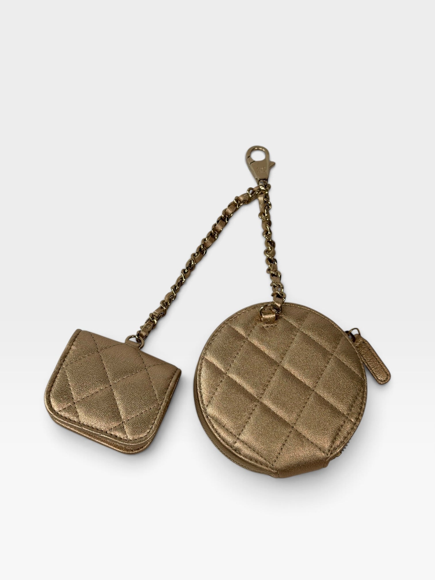 Chanel Round Purse and AirPods Case In Metallic Gold Lambskin. 100% authentic and preloved in excellent condition.