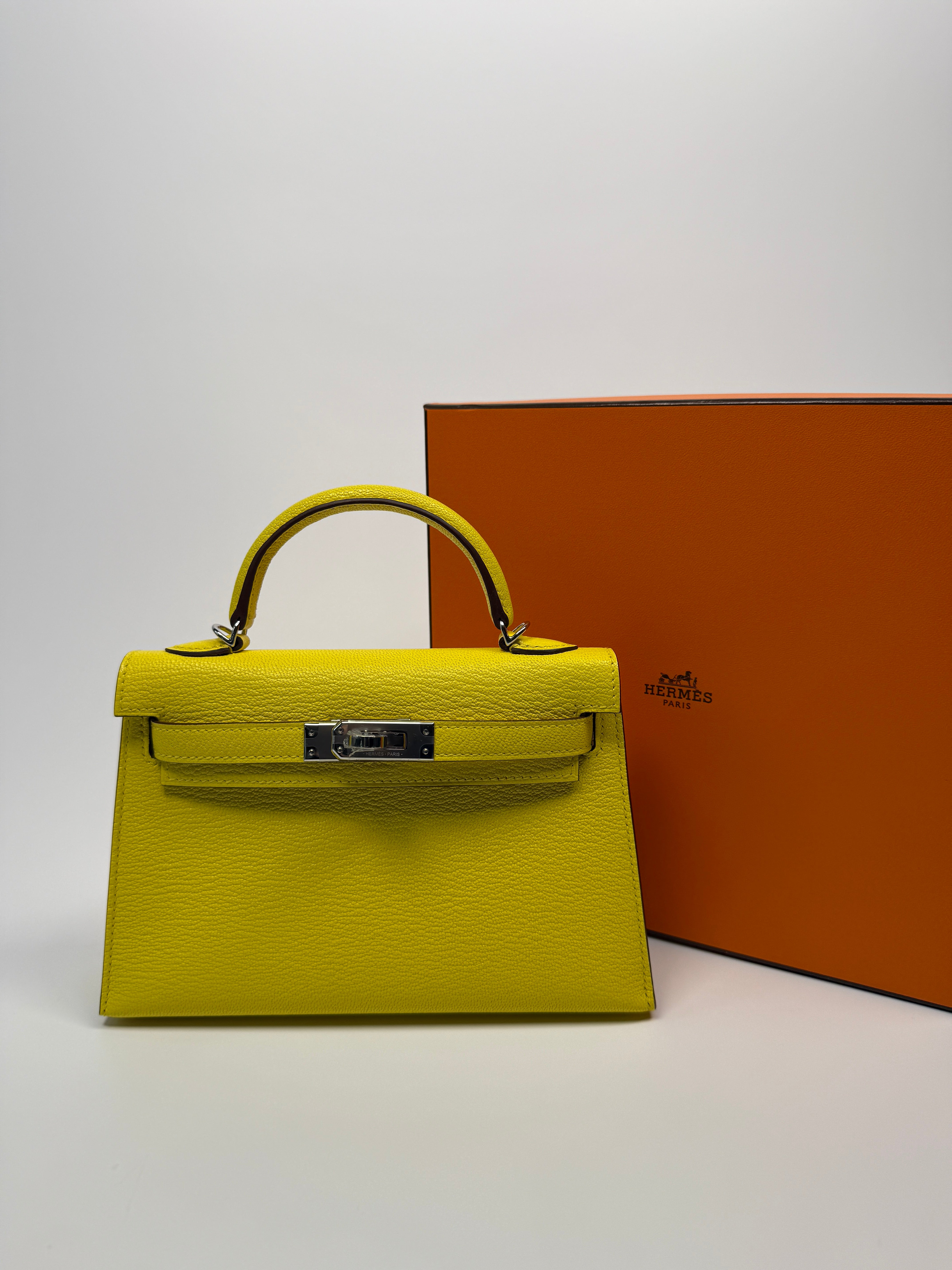 Authentic Pre Loved Hermés Mini Kelly ll Sellier Verso Chèvre Mysore in Jaune Citron and Mushroom With Palladium Hardware New & Unused Condition