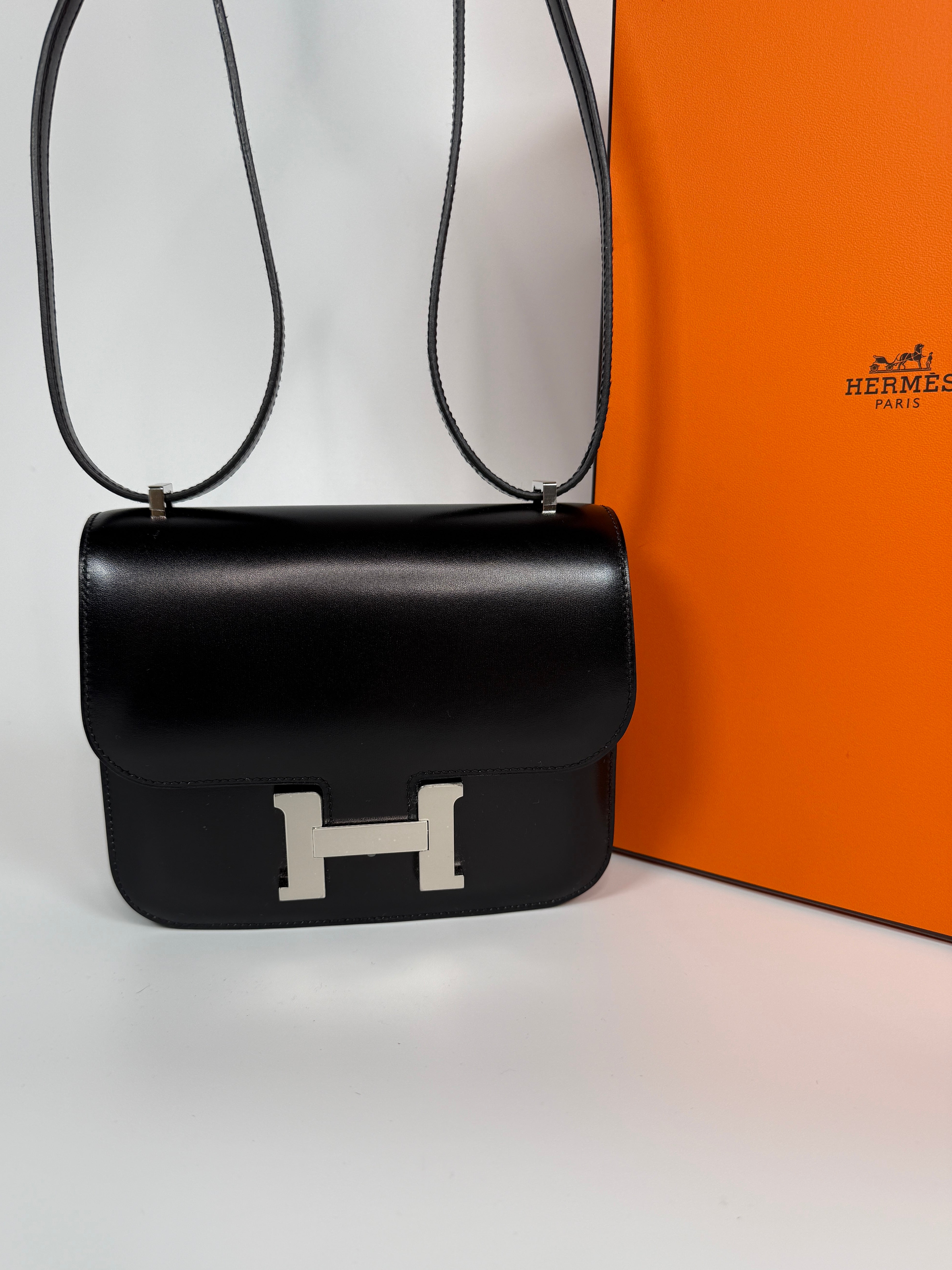 Authentic and preloved Hermès Constance 18 In Black Box Leather With Palladium Hardware. 100% Authenticity guarantee.