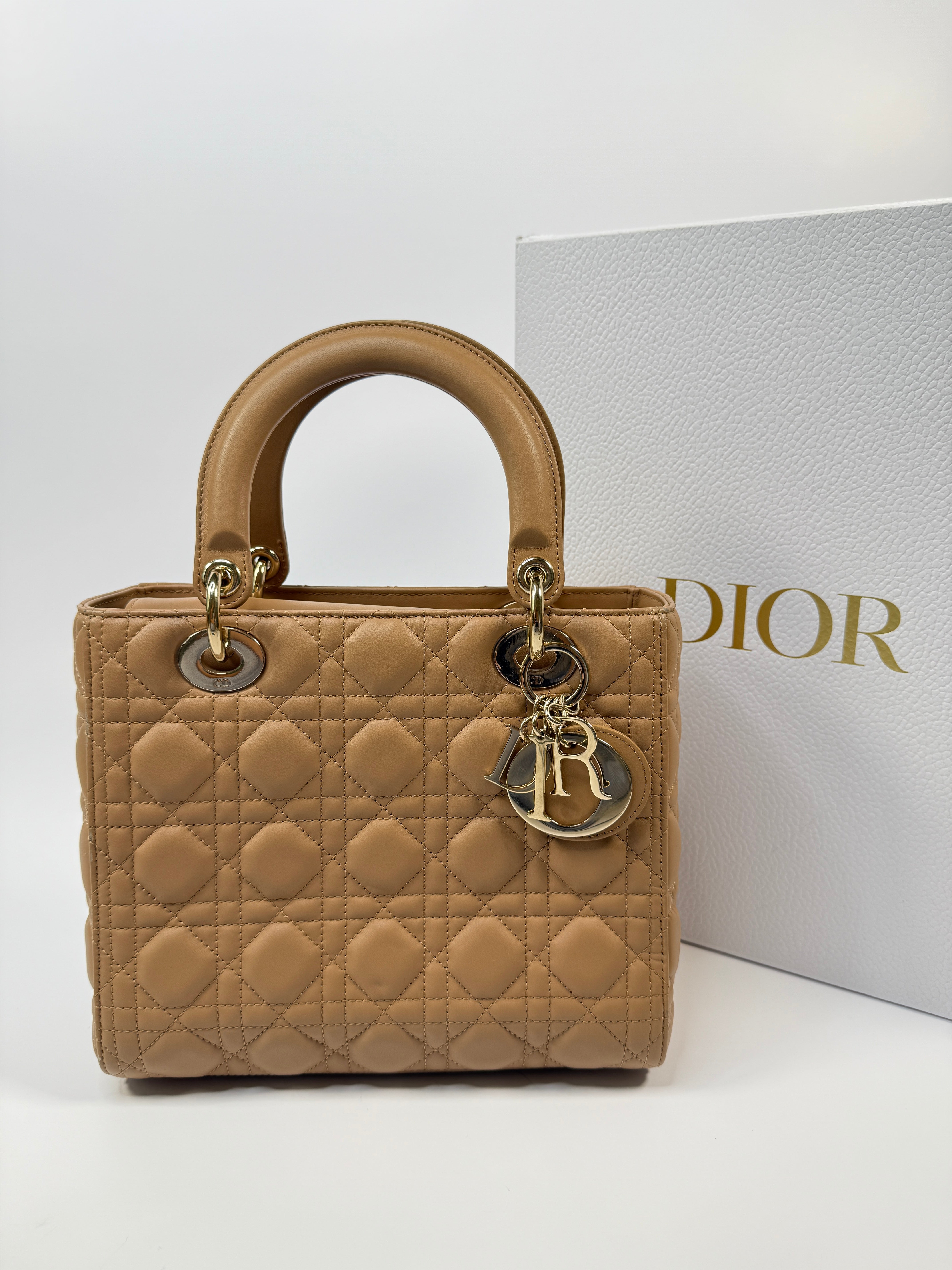 Authentic pre-loved Christian Dior Medium Lady Dior Bag in gold with gold hardware