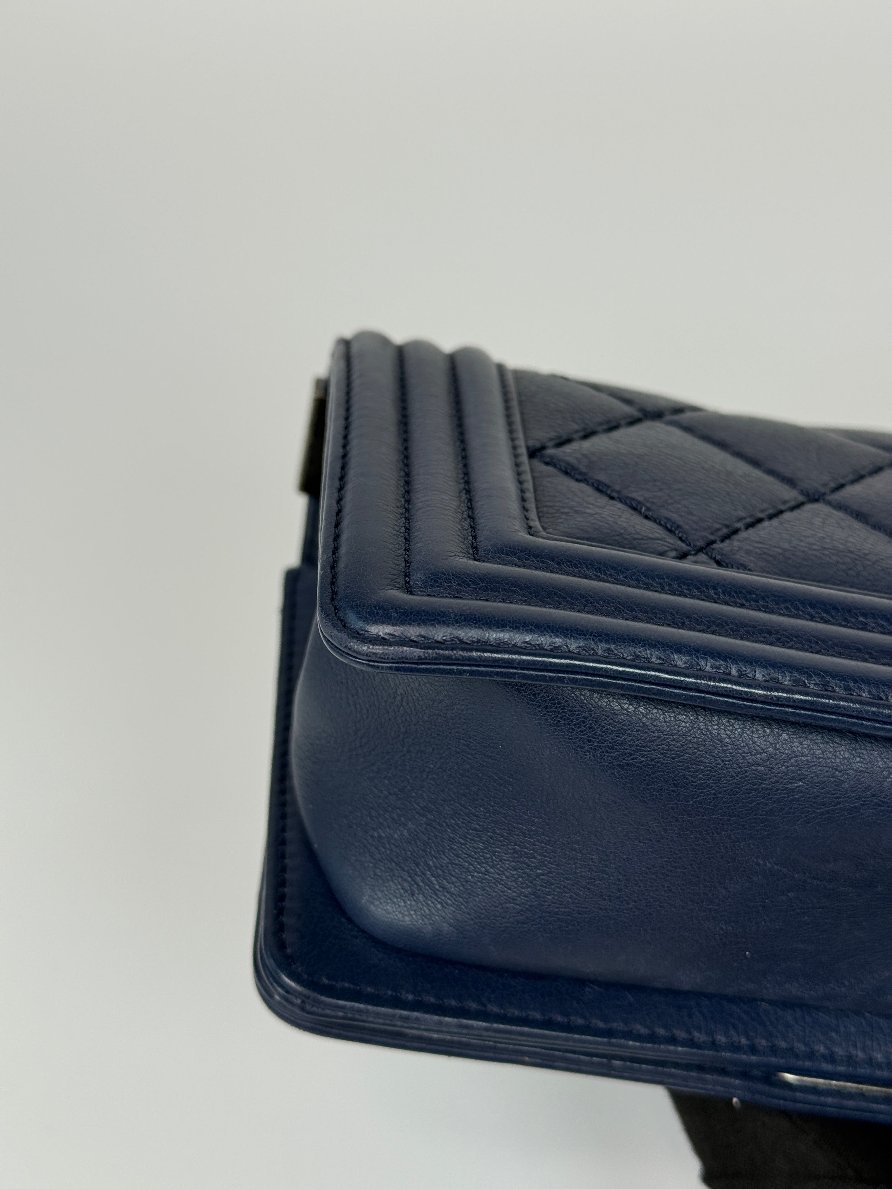Chanel Mini Boy Bag In Navy Lambskin With Ruthenium Hardware In Excellent Condition.
Authentic Pre Loved Verified by Luxe Cheshire Trusted Designer resale