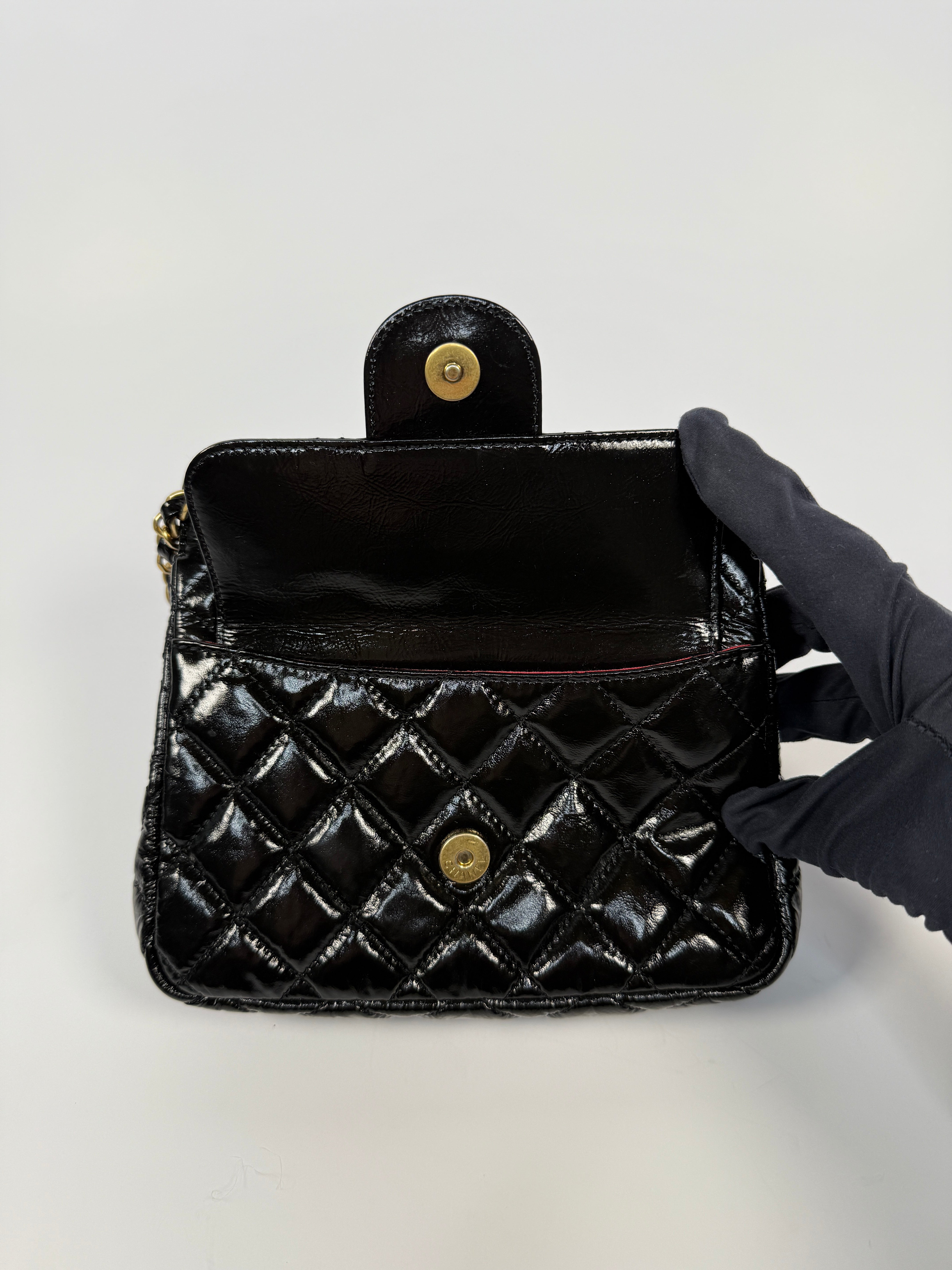 Chanel Mini Quilted Medallion Shoulder Bag In Black Calfskin With Gold Hardware. Authentic and preloved. Excellent condition.