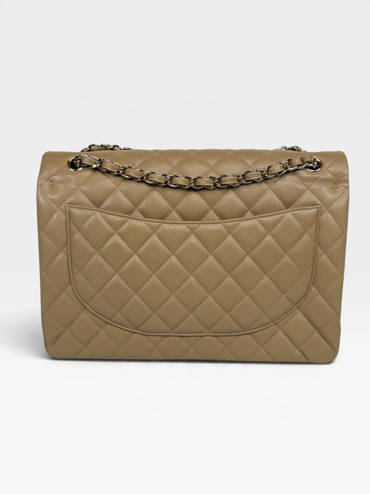 Chanel Maxi Flap In Beige Caviar Leather With Gold Hardware. 100% authentic and pre loved in excellent condition.