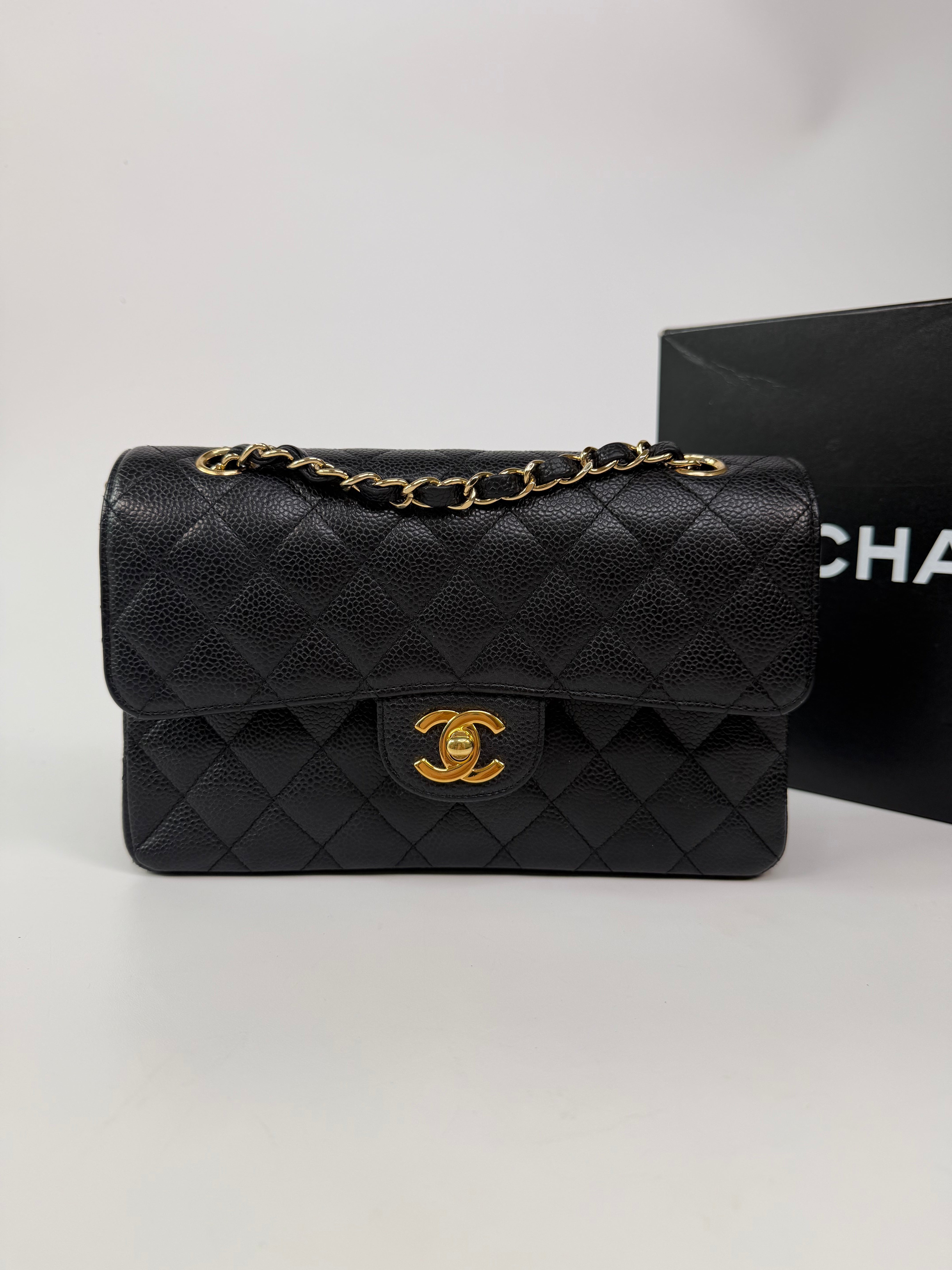Chanel Small Classic Double Flap In Black Caviar Leather With Gold Hardware. 100% authentic and preloved in excellent condition