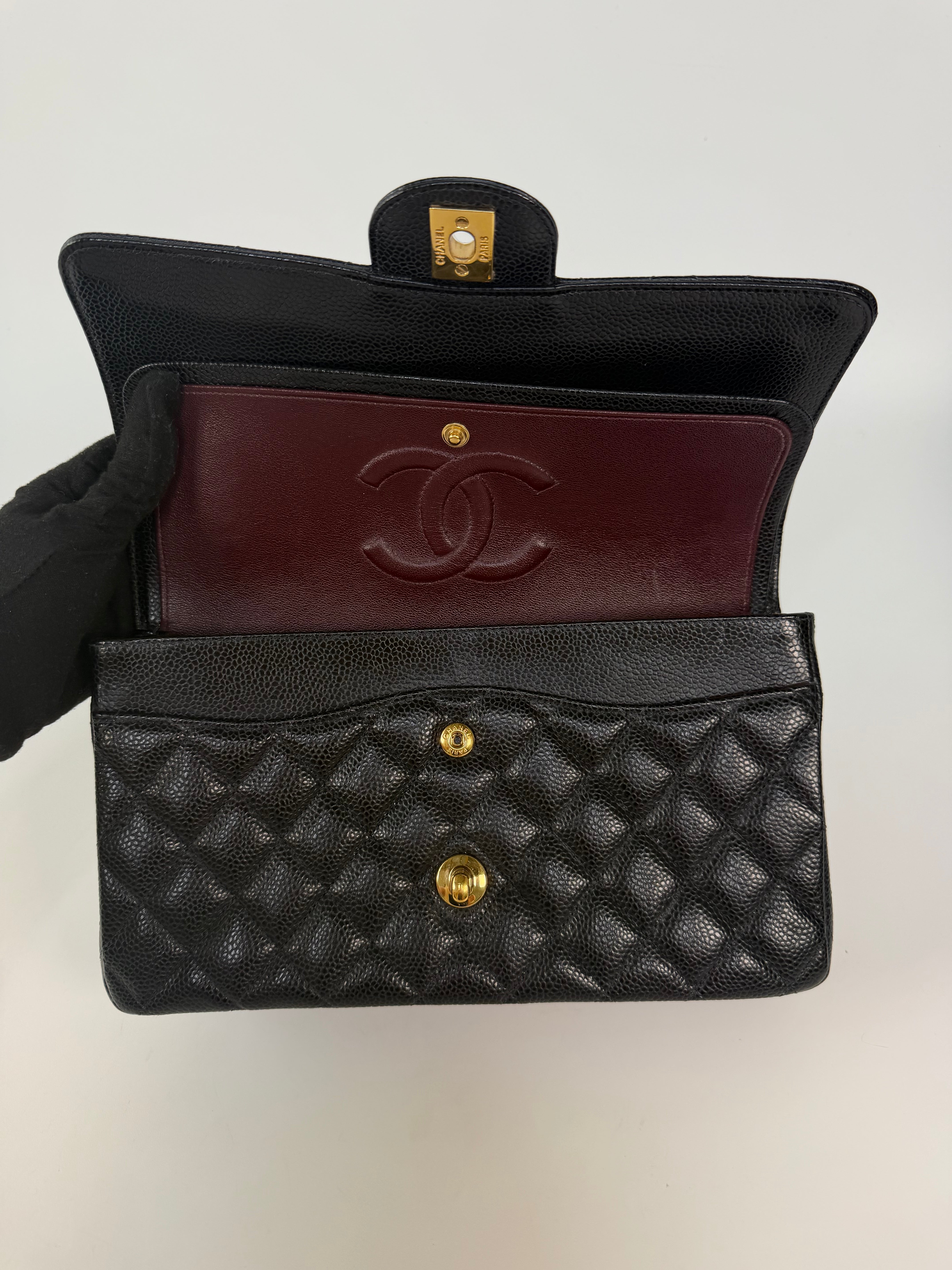 Chanel Medium Classic Double Flap In Black Caviar Leather Gold Hardware 100% authentic and preloved in excellent condition