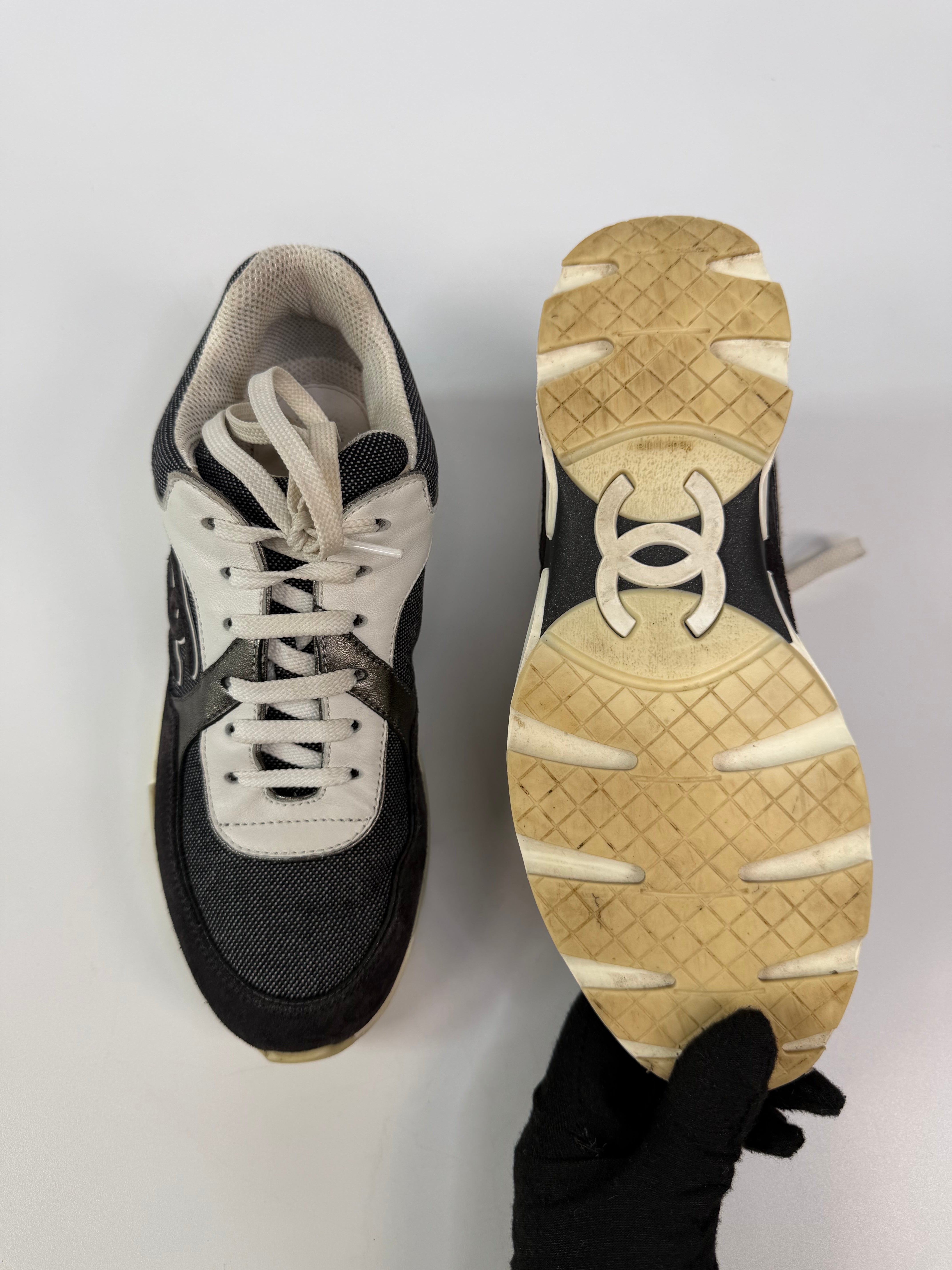 Chanel CC Sneakers In Dark Grey, White & Silver (Size 36.5/UK3.5). 100% authentic and preloved in excellent condition.