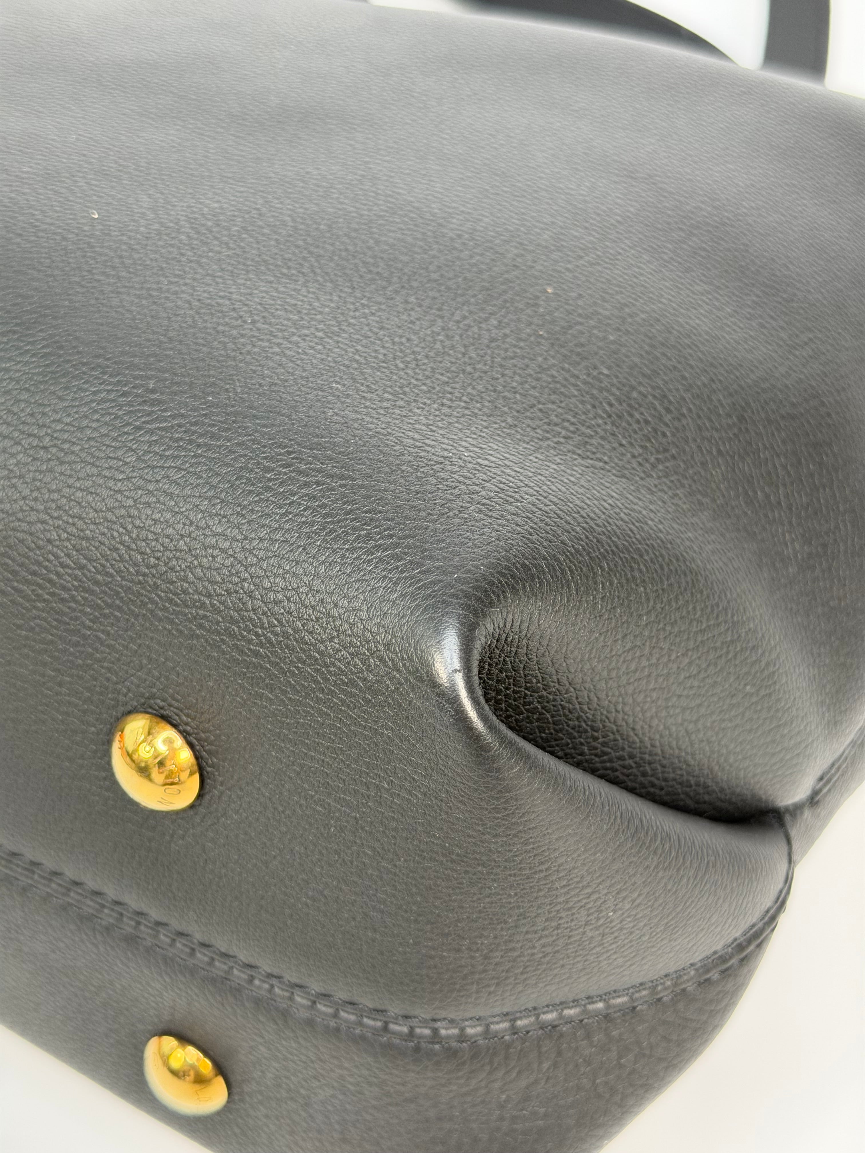 Louis Vuitton Low Key Cabas MM In Black Calfskin With Gold Hardware. Authentic and preloved in excellent condition
