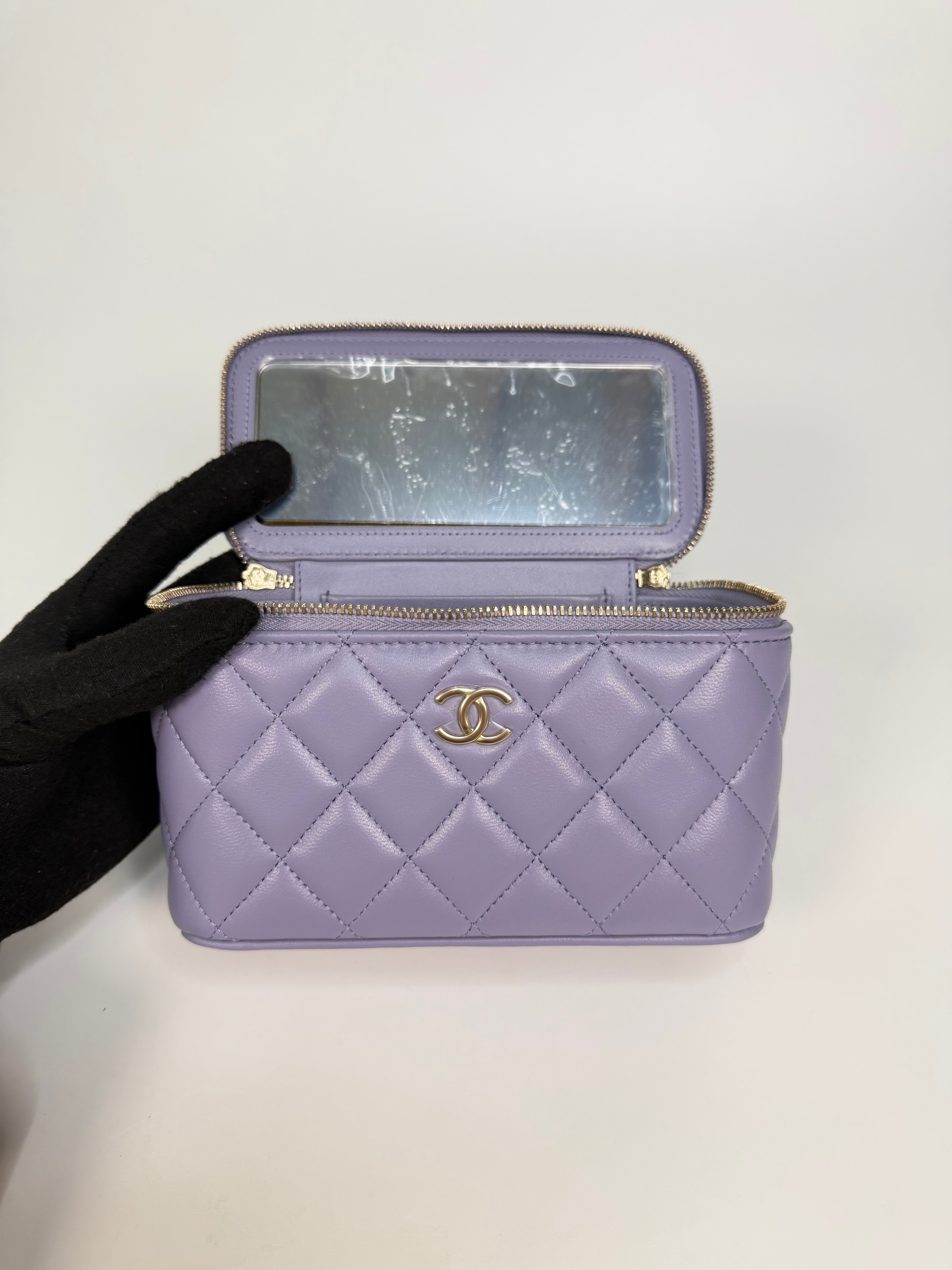 Chanel Mini Vanity Top Handle In Lilac Lambskin Leather With Gold Hardware. Authentic and preloved in excellent condition