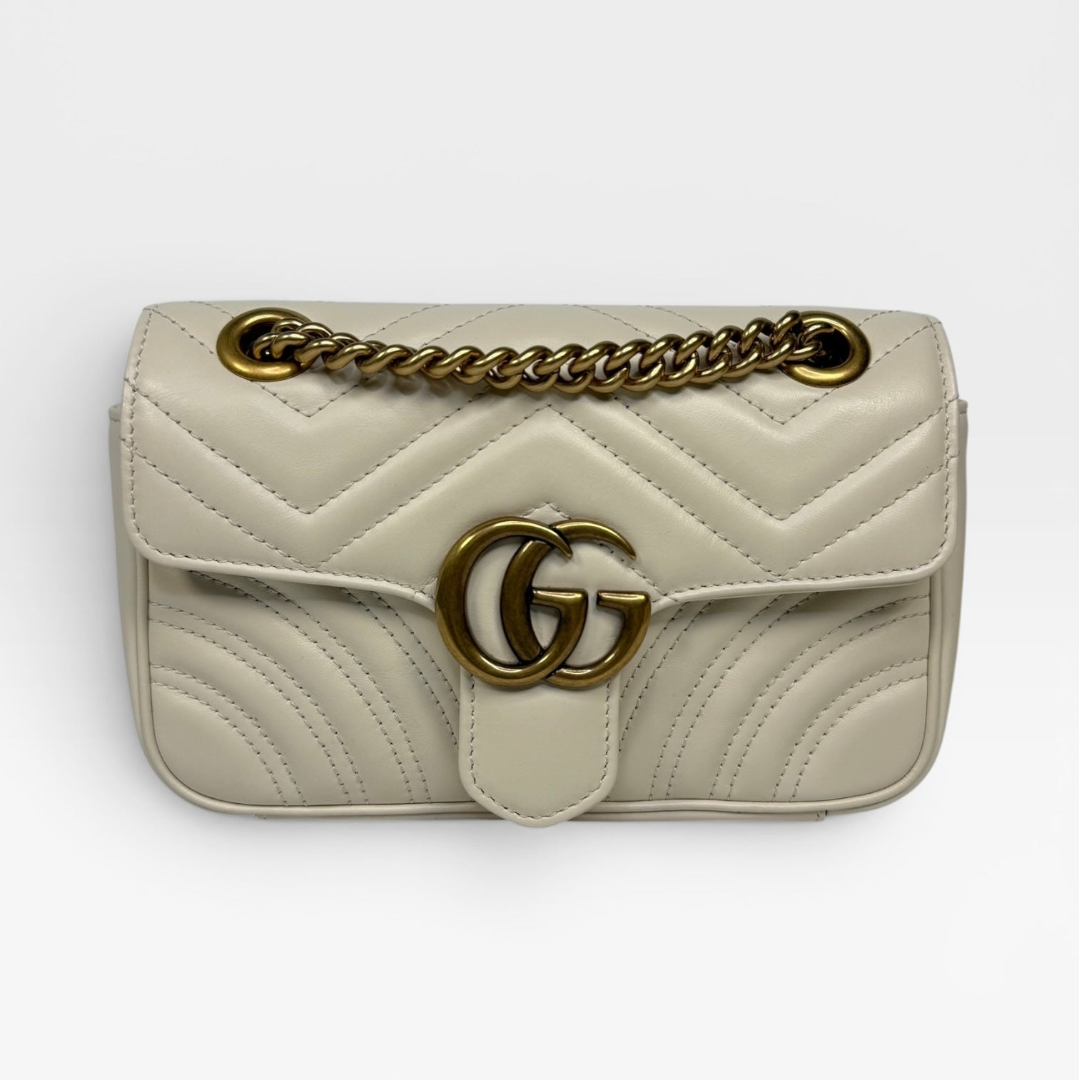 Gucci GG Small Marmont Matelasse Shoulder Bag In Ivory Leather With Gold Hardware