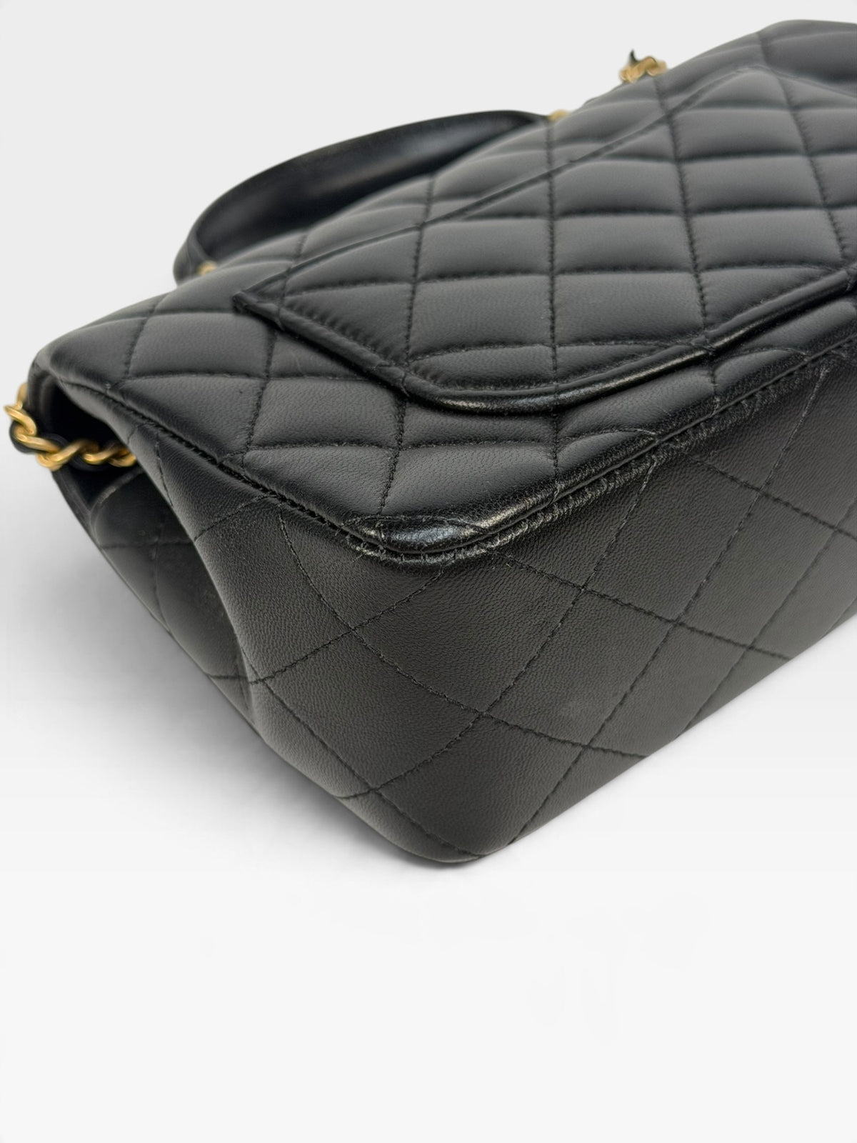 Chanel Mini Rectangle Top Handle In Black Lambskin With Gold Hardware. 100% authentic and pre loved in excellent condition.