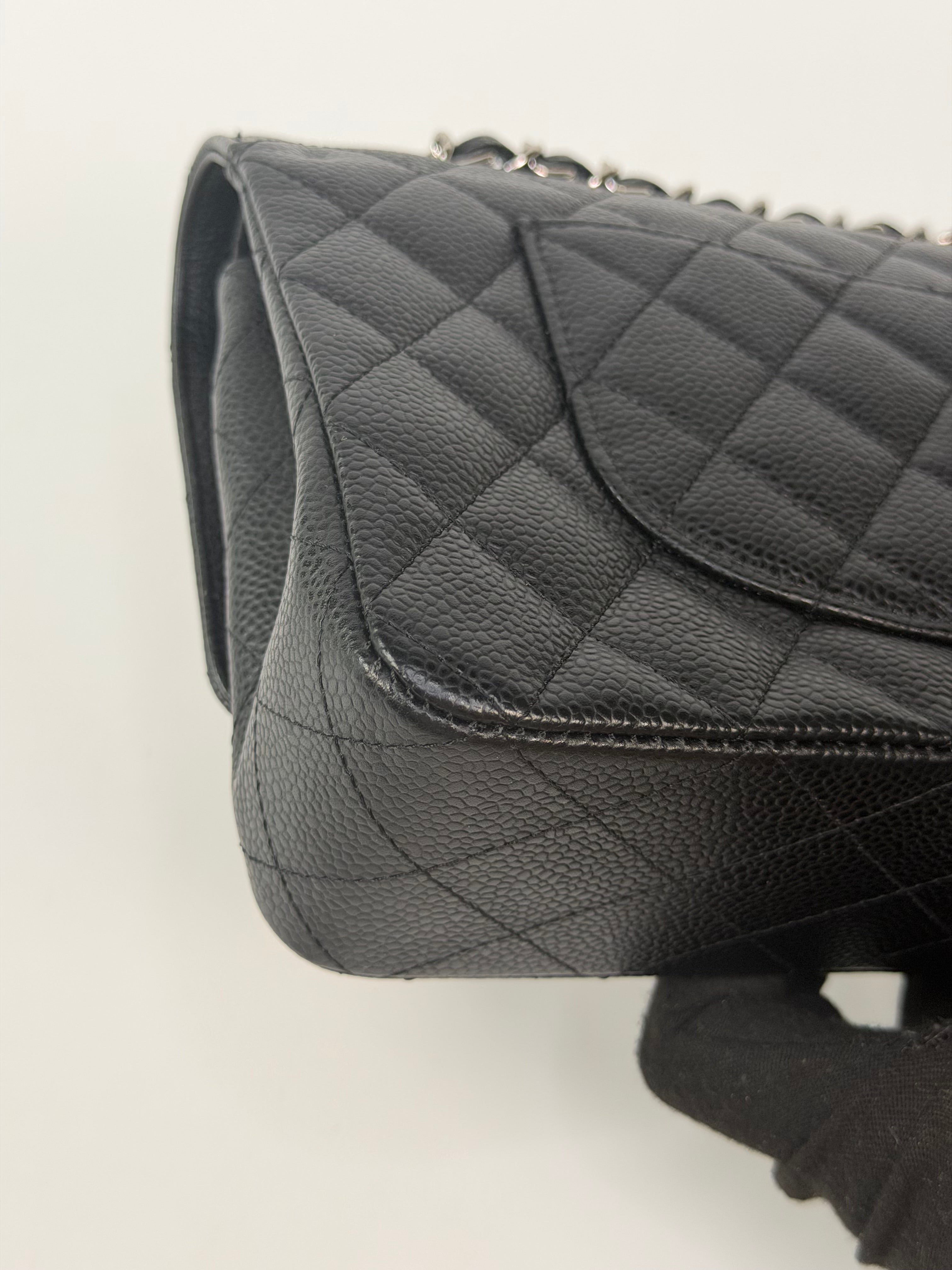 Chanel Vintage Medium Classic Double Flap Black Caviar Silver Hardware. 100% authentic and preloved in excellent condition