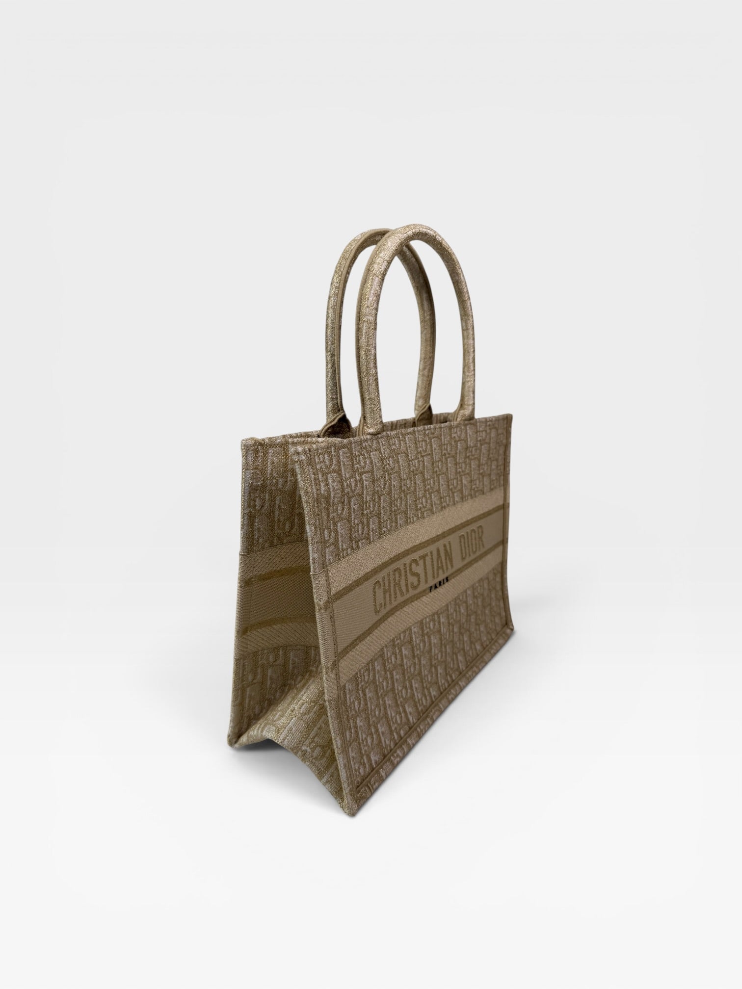 Christian Dior Medium Book Tote In Latte & Gold Tone Dioresque. Authentic and preloved in new and unused condition. 100% trusted guarantee