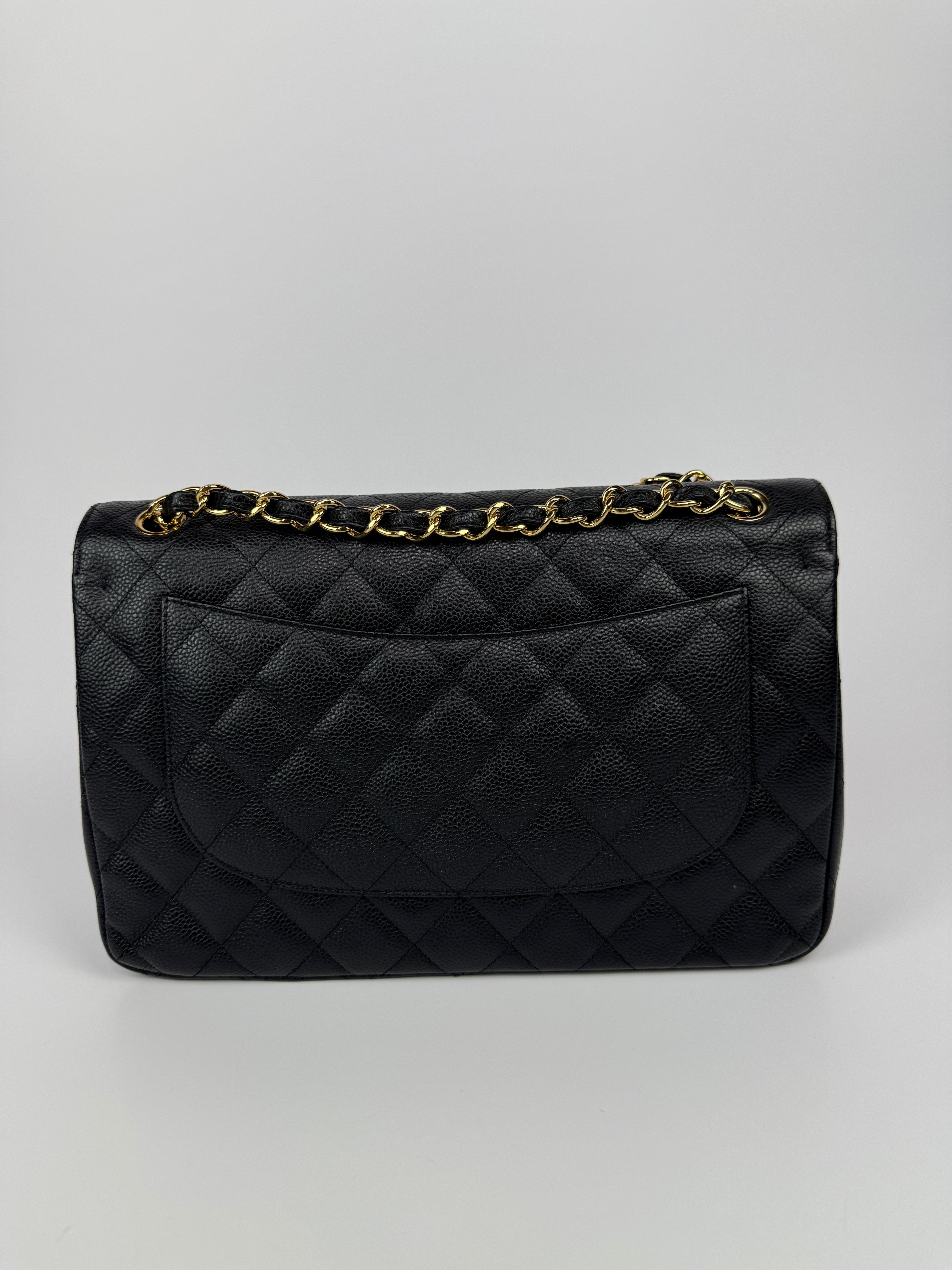 Chanel Jumbo Classic Double Flap In Black Caviar Gold Hardware
Pre Loved & Authentic