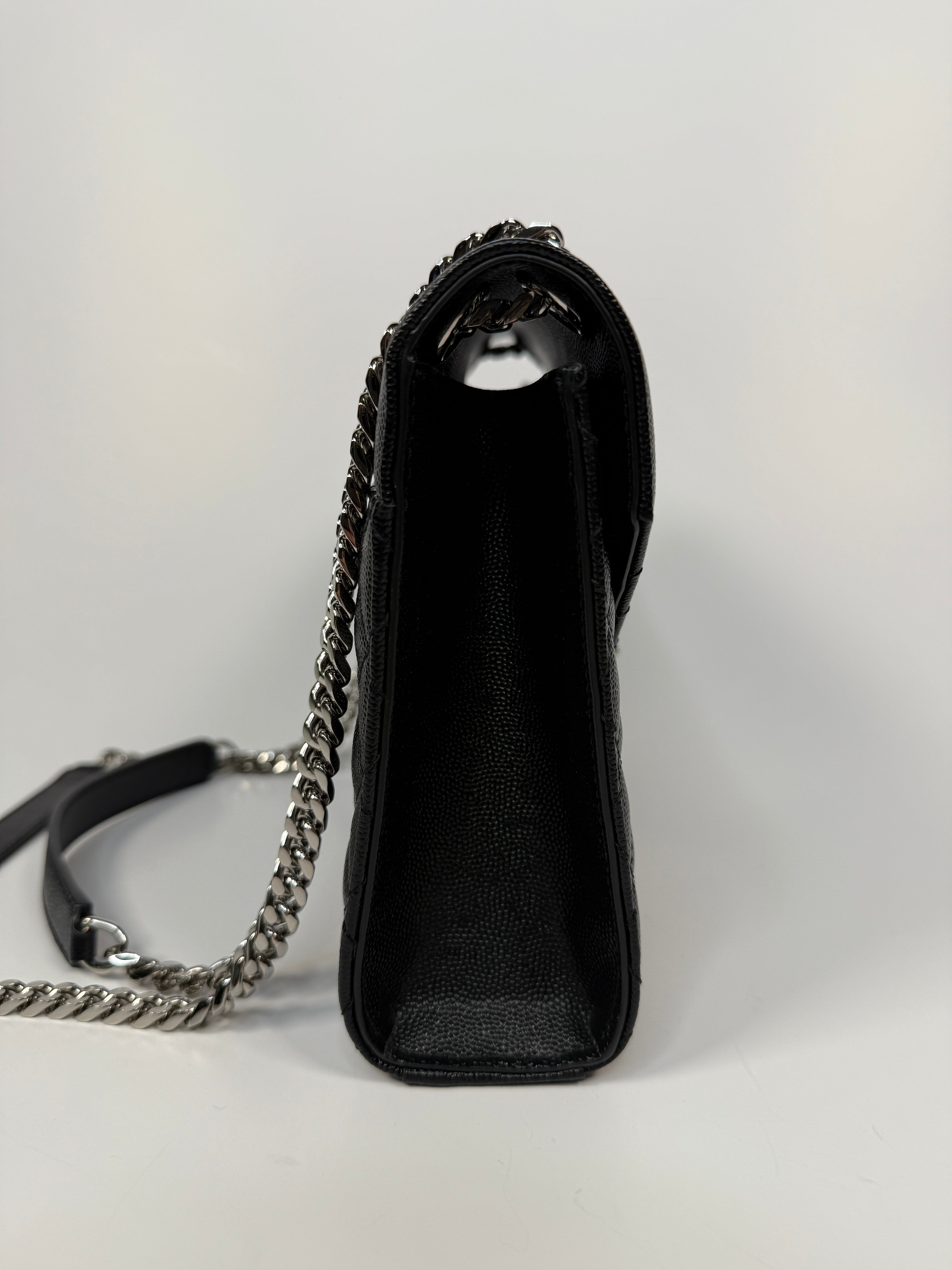 Saint Laurent Medium Envelope Bag In Blacked Grained Leather With Silver Hardware. Authentic and preloved. Excellent Condition