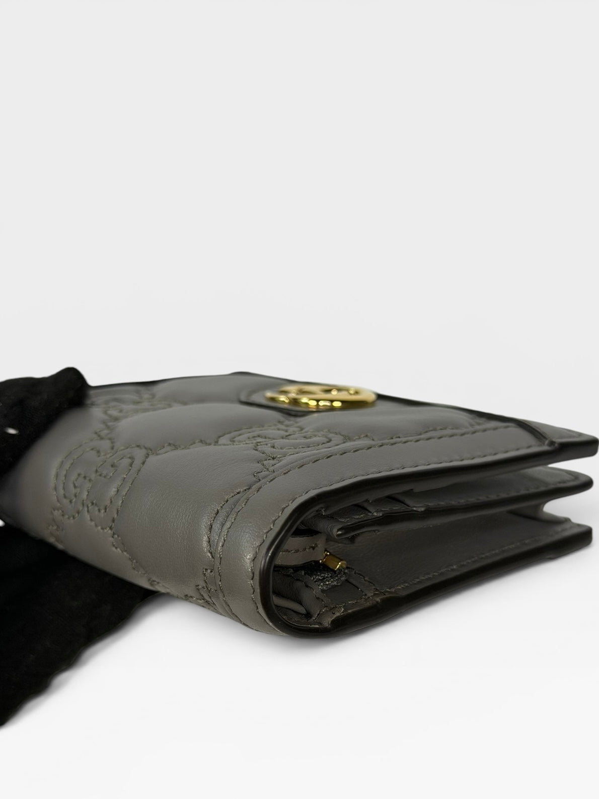 Gucci GG Embossed Wallet In Grey Leather With Gold Hardware. Authentic and preloved in excellent condition.