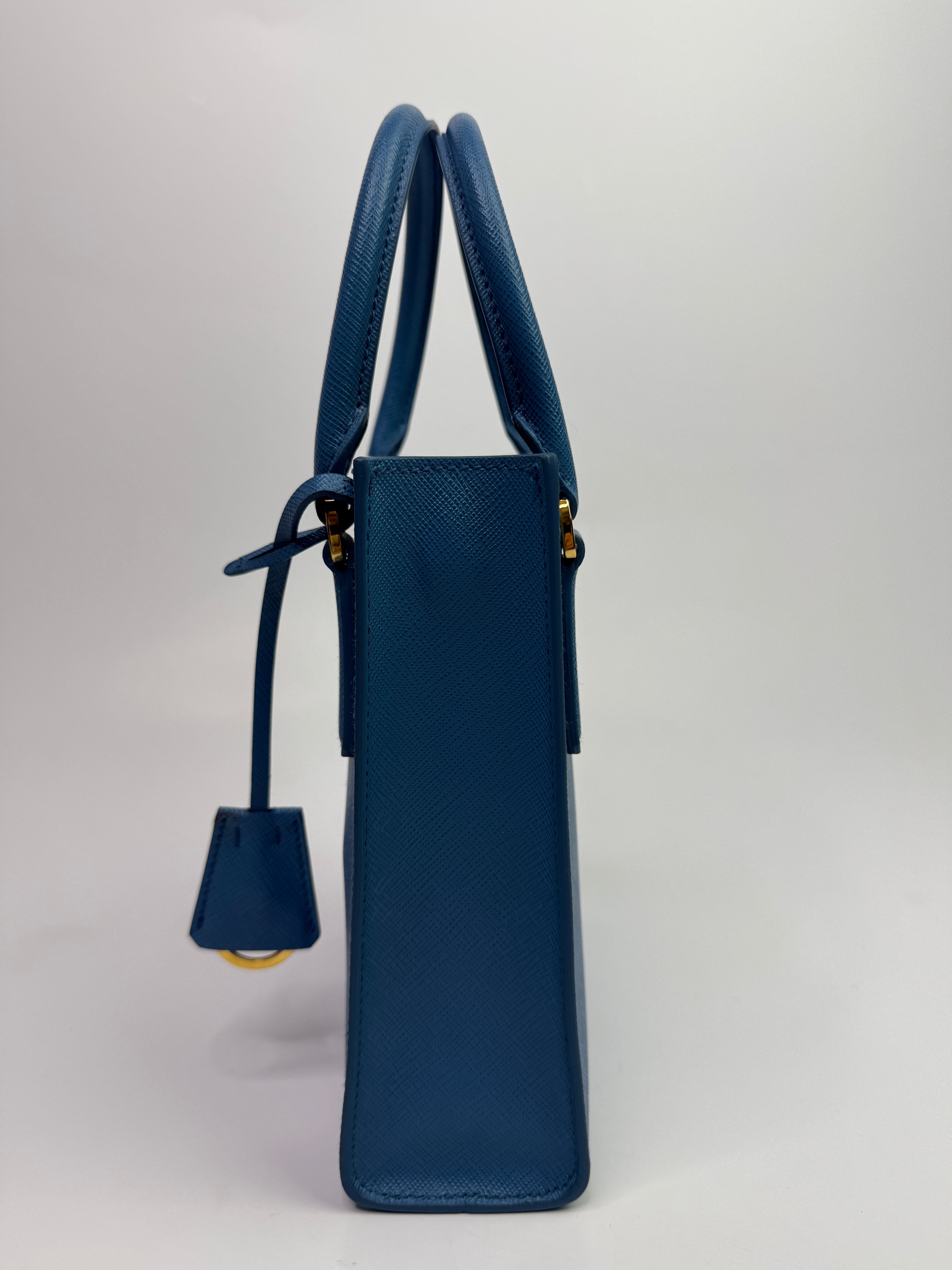 Prada Mini Tote In Powder Blue Saffiano Leather
Authentic Pre Loved Verified by Luxe Cheshire Trusted Designer resale