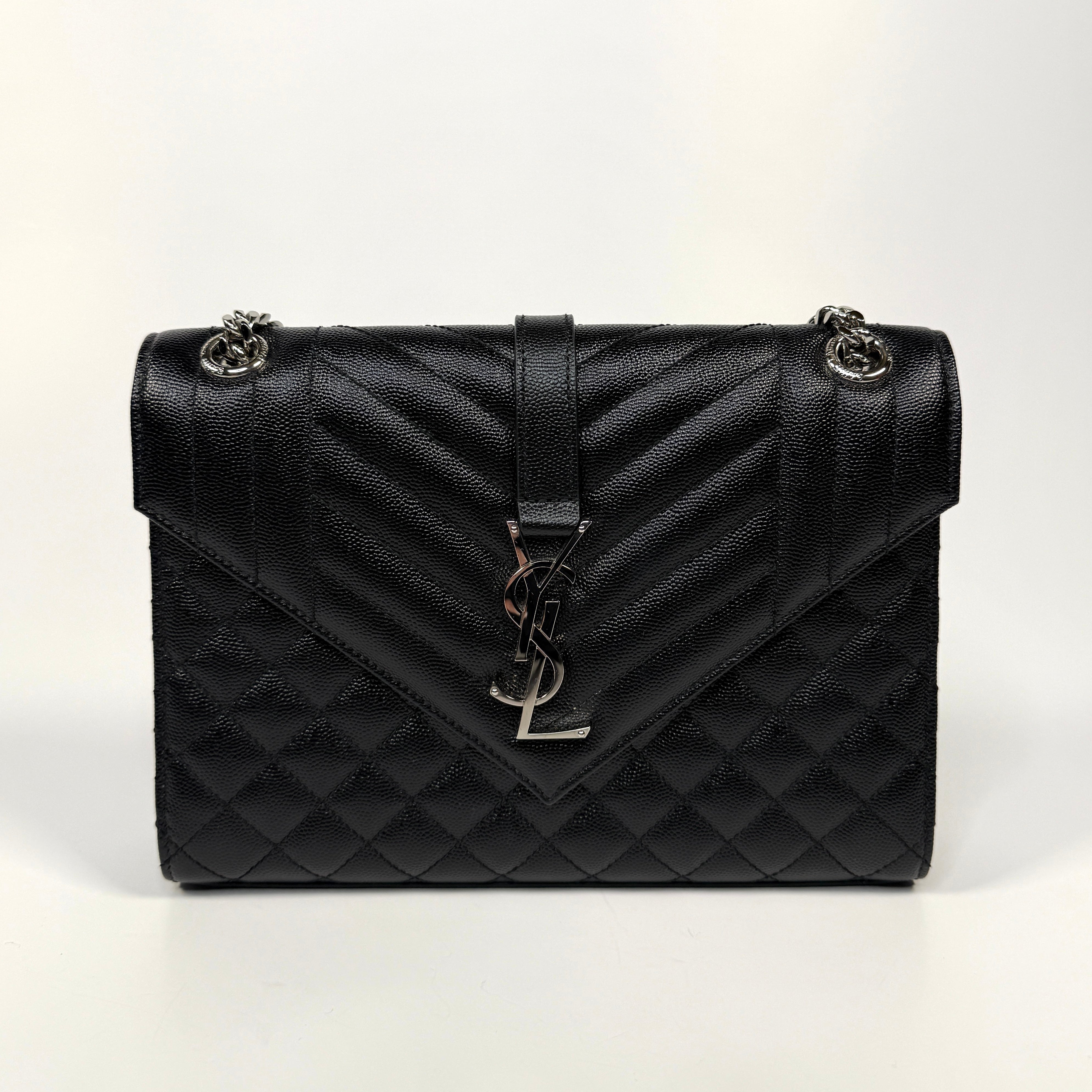 Saint Laurent Medium Envelope Bag In Blacked Grained Leather With Silver Hardware. Authentic and preloved. Excellent Condition