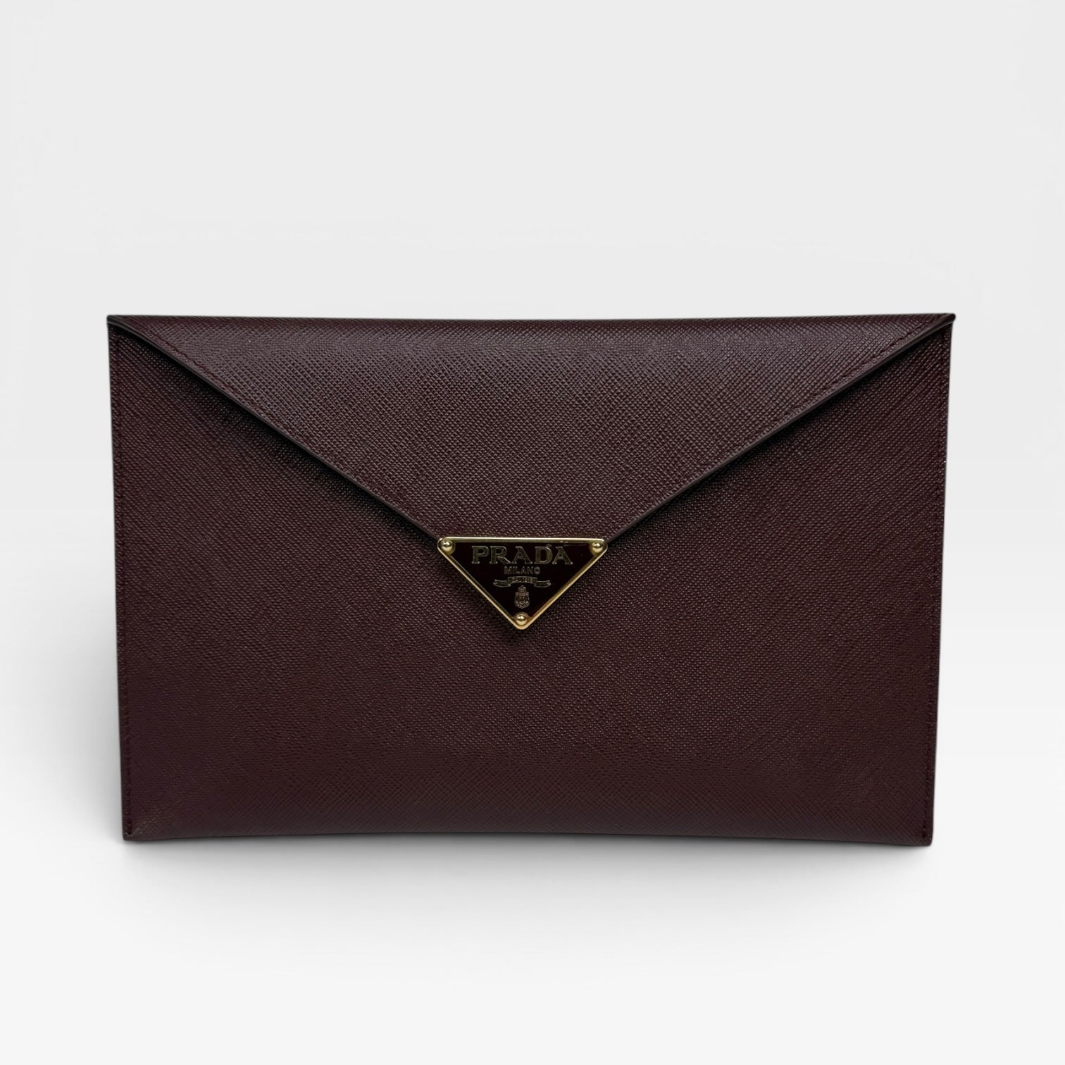 Prada Clutch In Burgundy Saffiano Leather With Gold Hardware