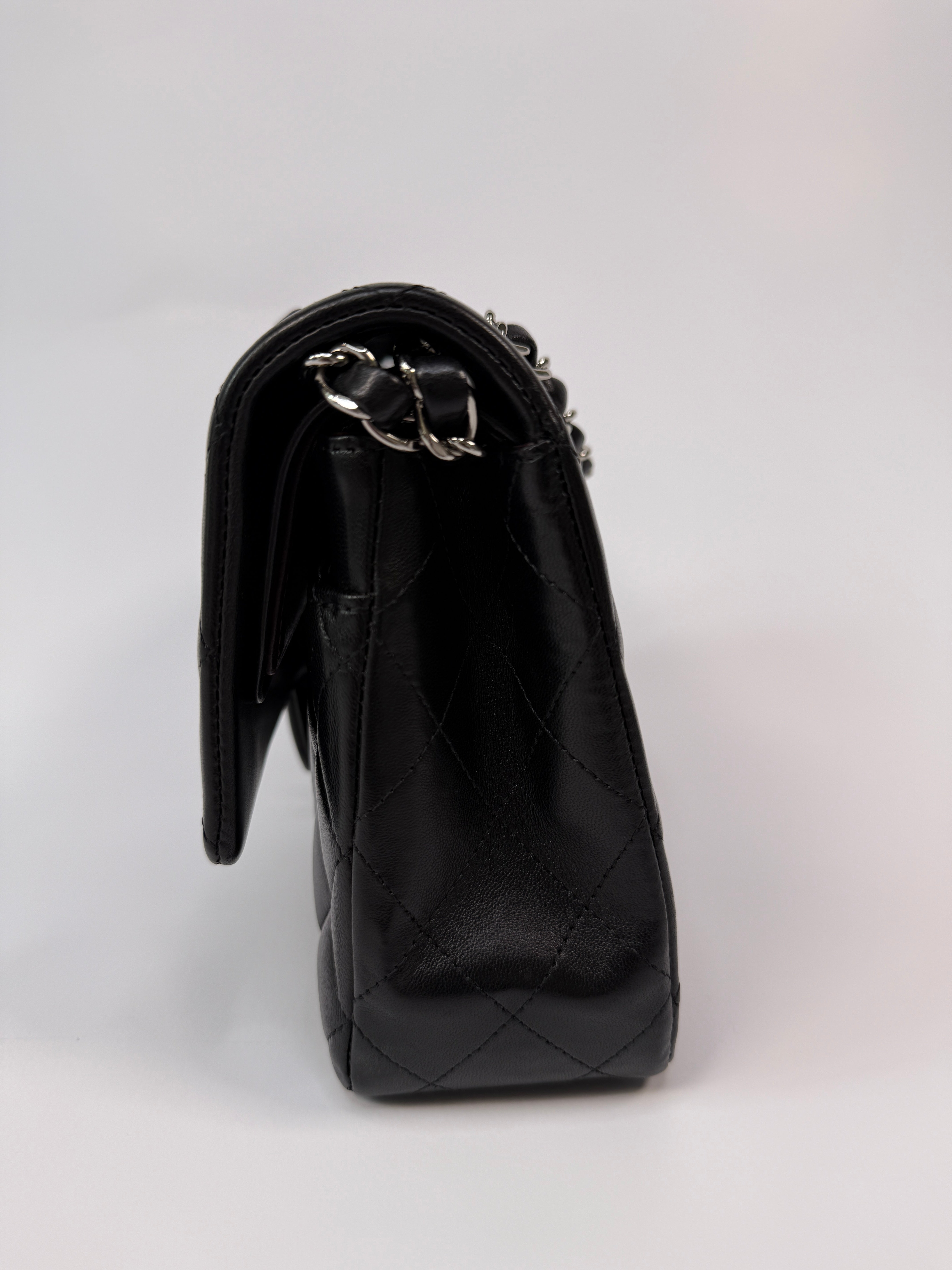 Chanel Medium Classic Double Flap Black Lambskin Leather With Silver Hardware
Pre Loved & Authentic