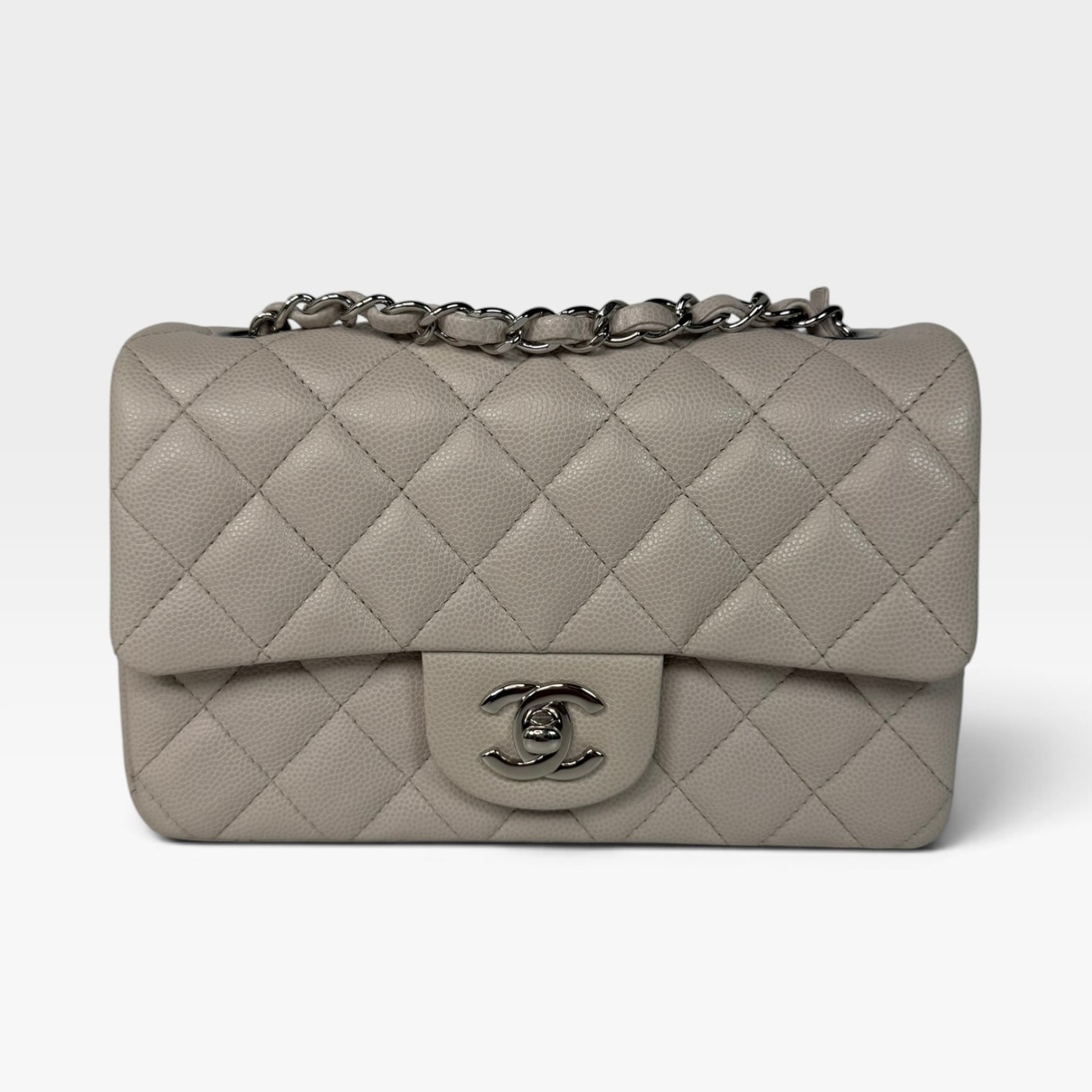 Chanel Mini Rectangle Pale Grey Caviar Leather With Silver Hardware in excellent condition 100% authentic and preloved