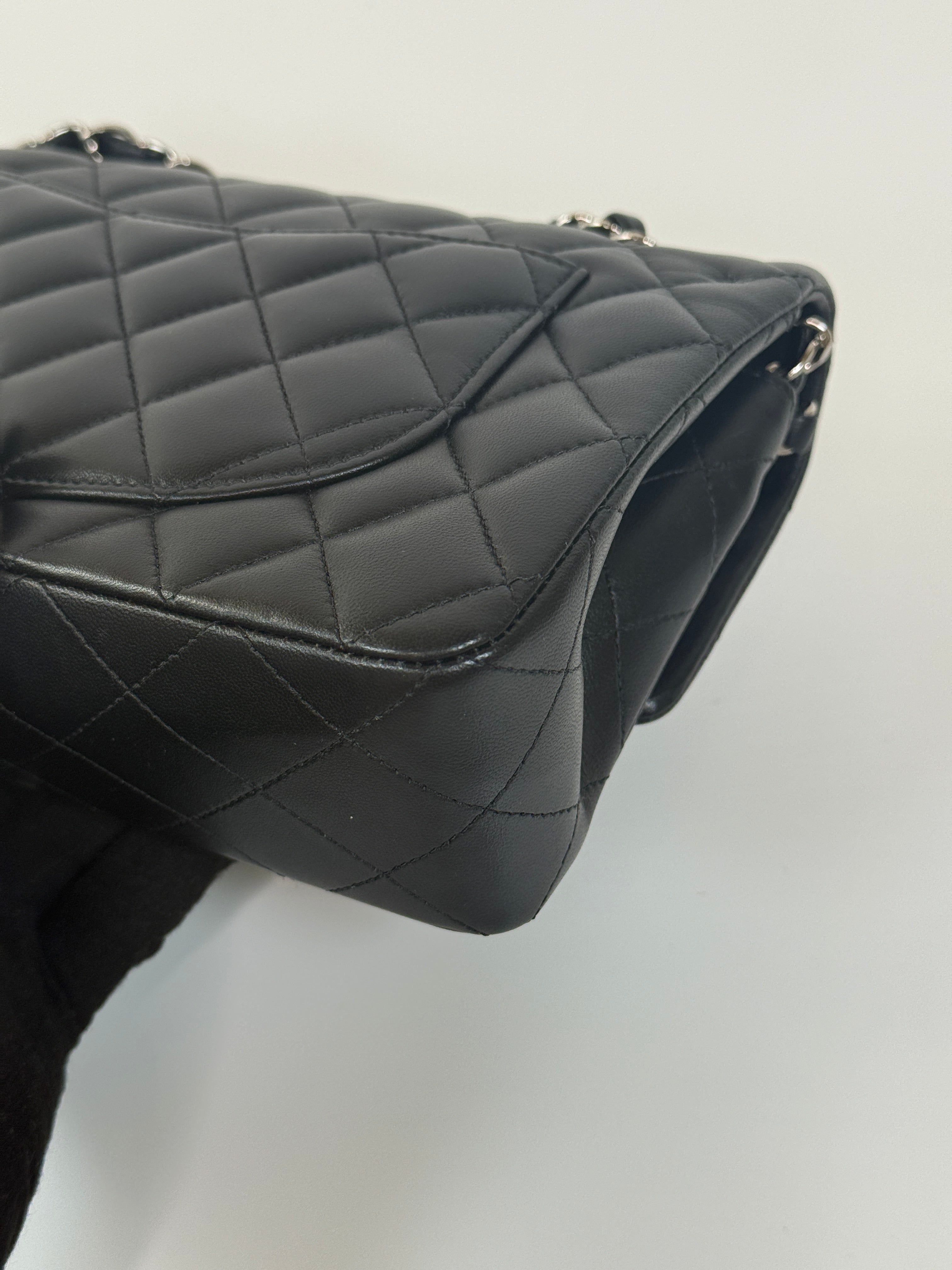 Chanel Small Classic Double Flap In Black Lambskin Leather With Silver Hardware Authentic and preloved in excellent condition. 100% Authenticity guarantee