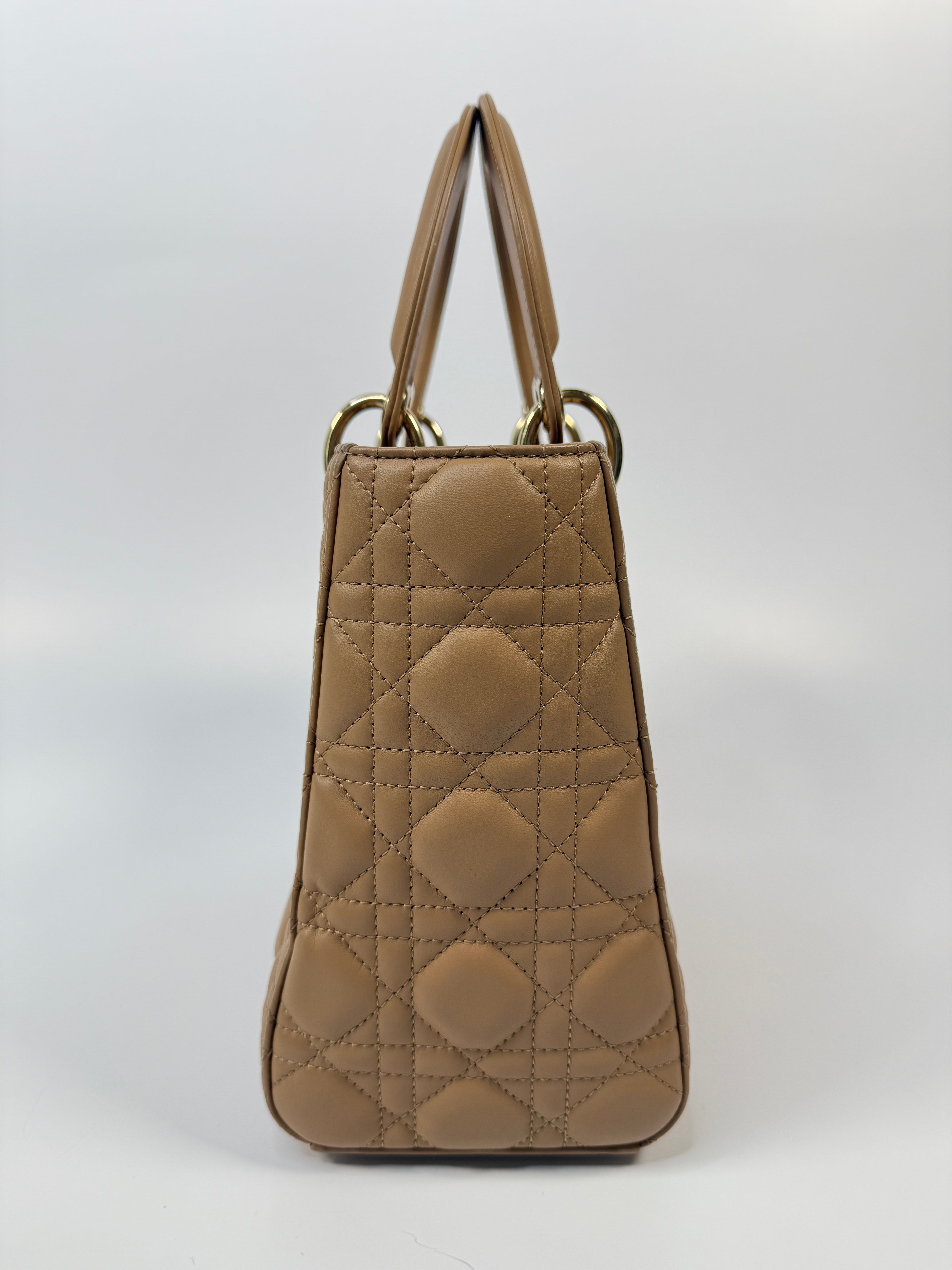 Authentic pre-loved Christian Dior Medium Lady Dior Bag in gold with gold hardware